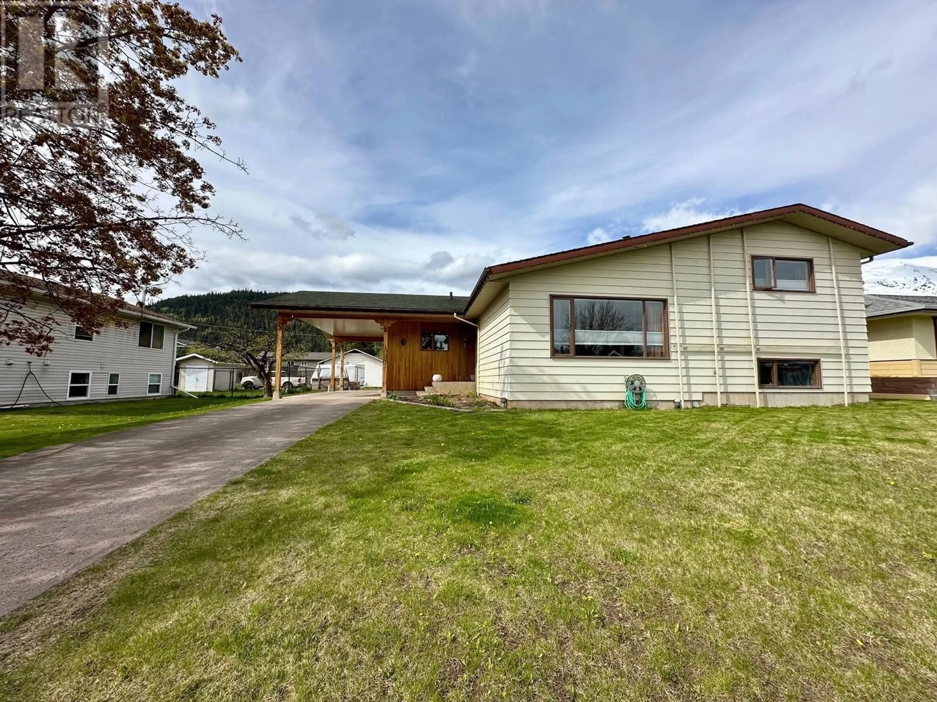 Home with vinyl exterior material, street for 4139 FIRST AVENUE, Smithers British Columbia V0J2N0