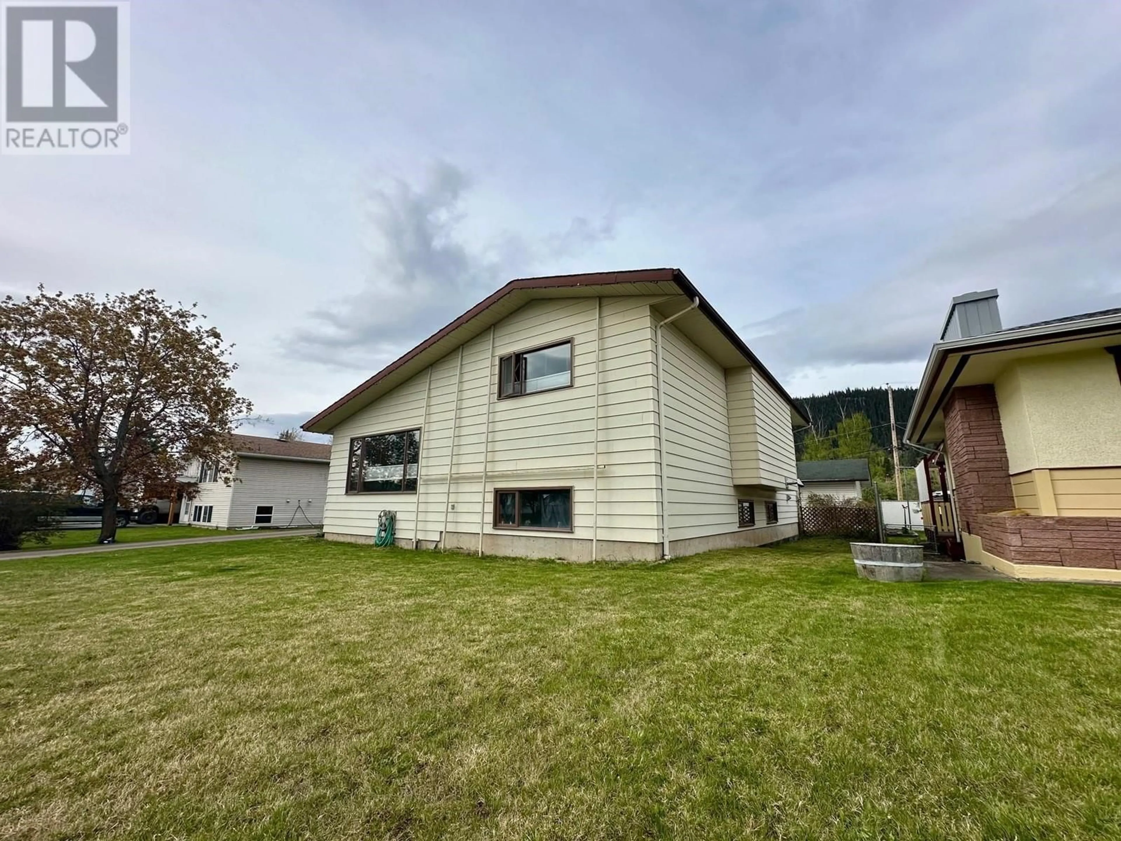 A pic from outside/outdoor area/front of a property/back of a property/a pic from drone, building for 4139 FIRST AVENUE, Smithers British Columbia V0J2N0