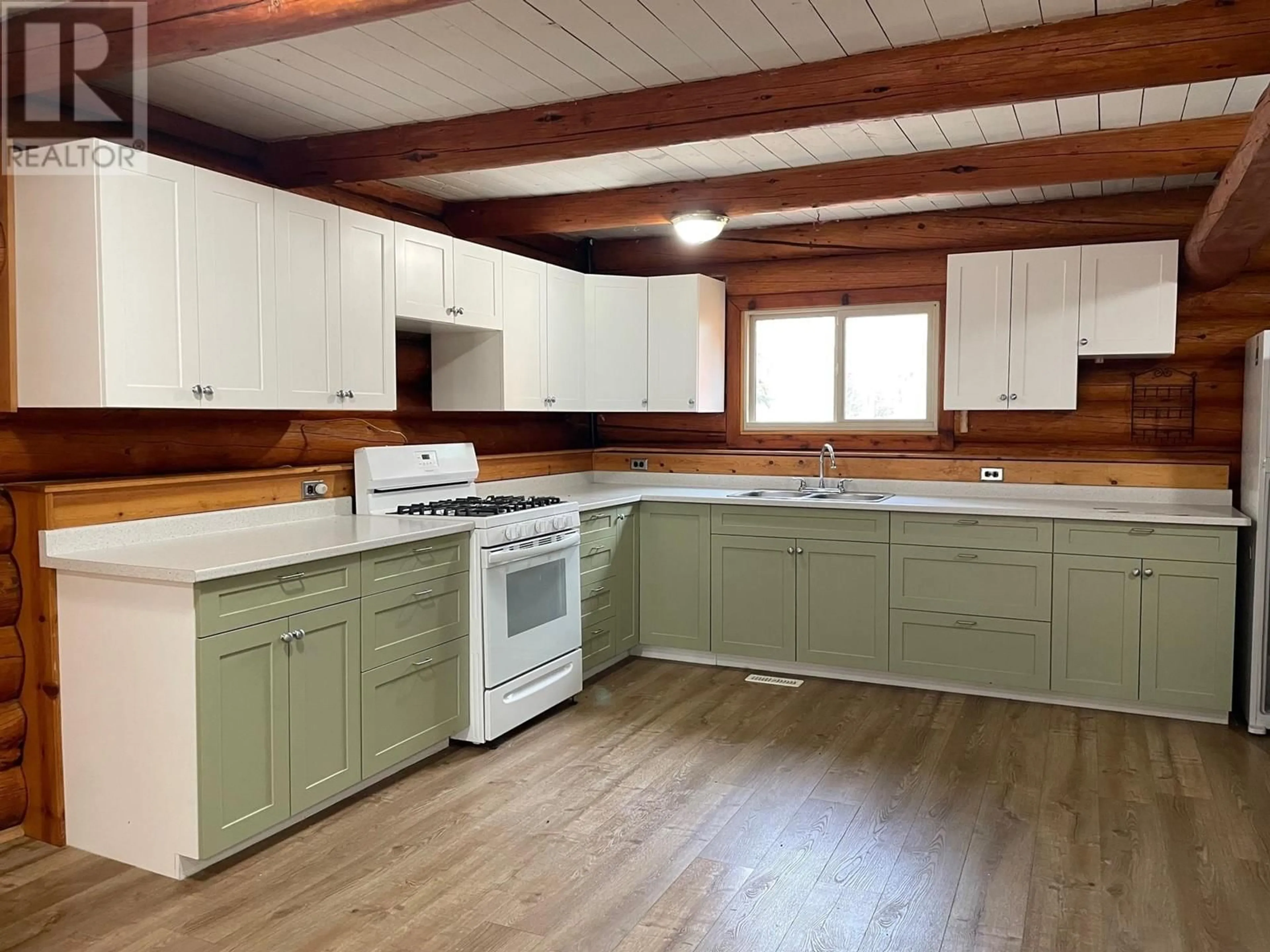 Open concept kitchen, wood/laminate floor for 12 WALSH ROAD, Fort Nelson British Columbia V0C1R0