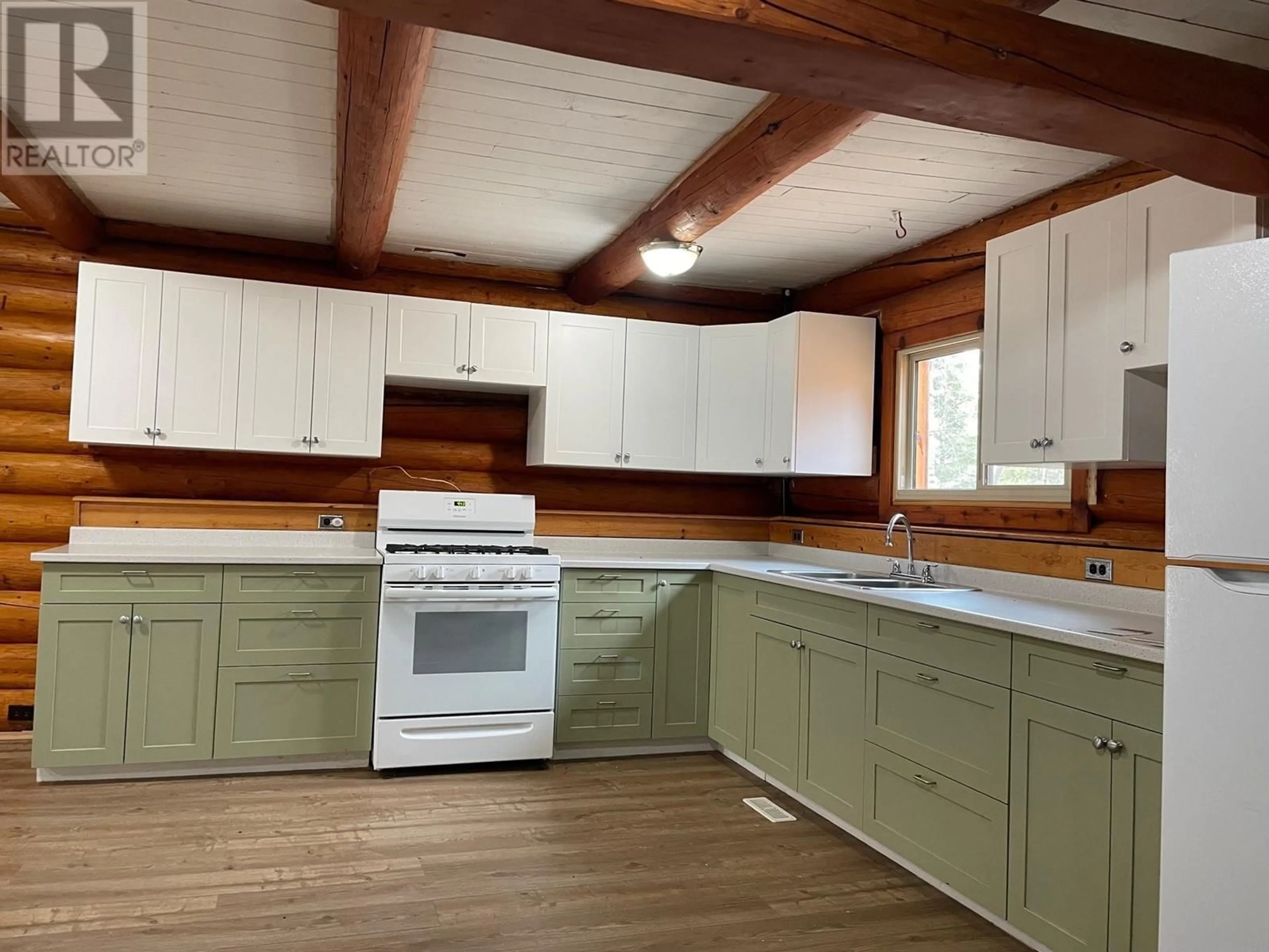 Open concept kitchen, wood/laminate floor for 12 WALSH ROAD, Fort Nelson British Columbia V0C1R0