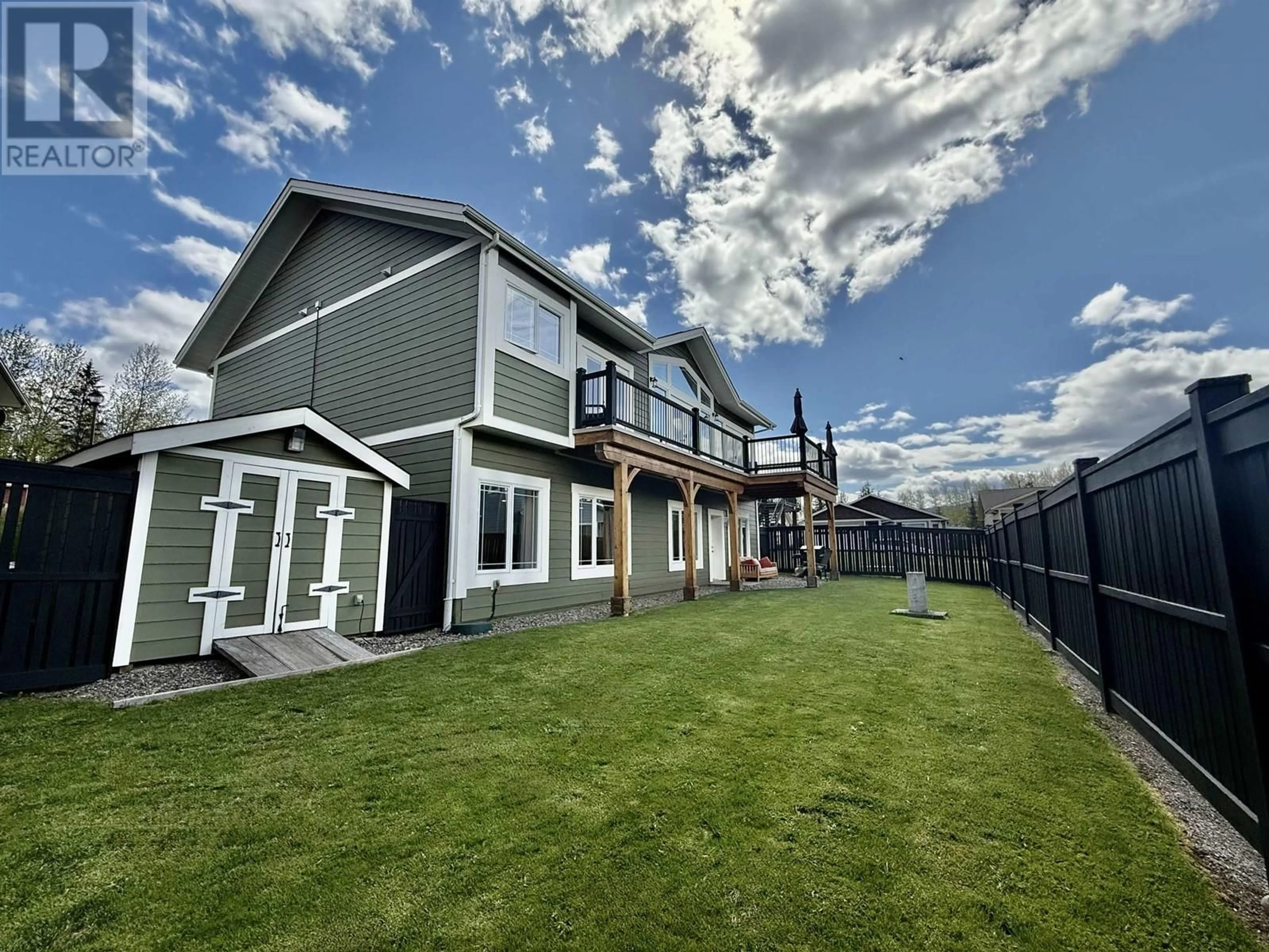 A pic from outside/outdoor area/front of a property/back of a property/a pic from drone, mountain view for 7 AURORA AVENUE, Smithers British Columbia V0J2N2