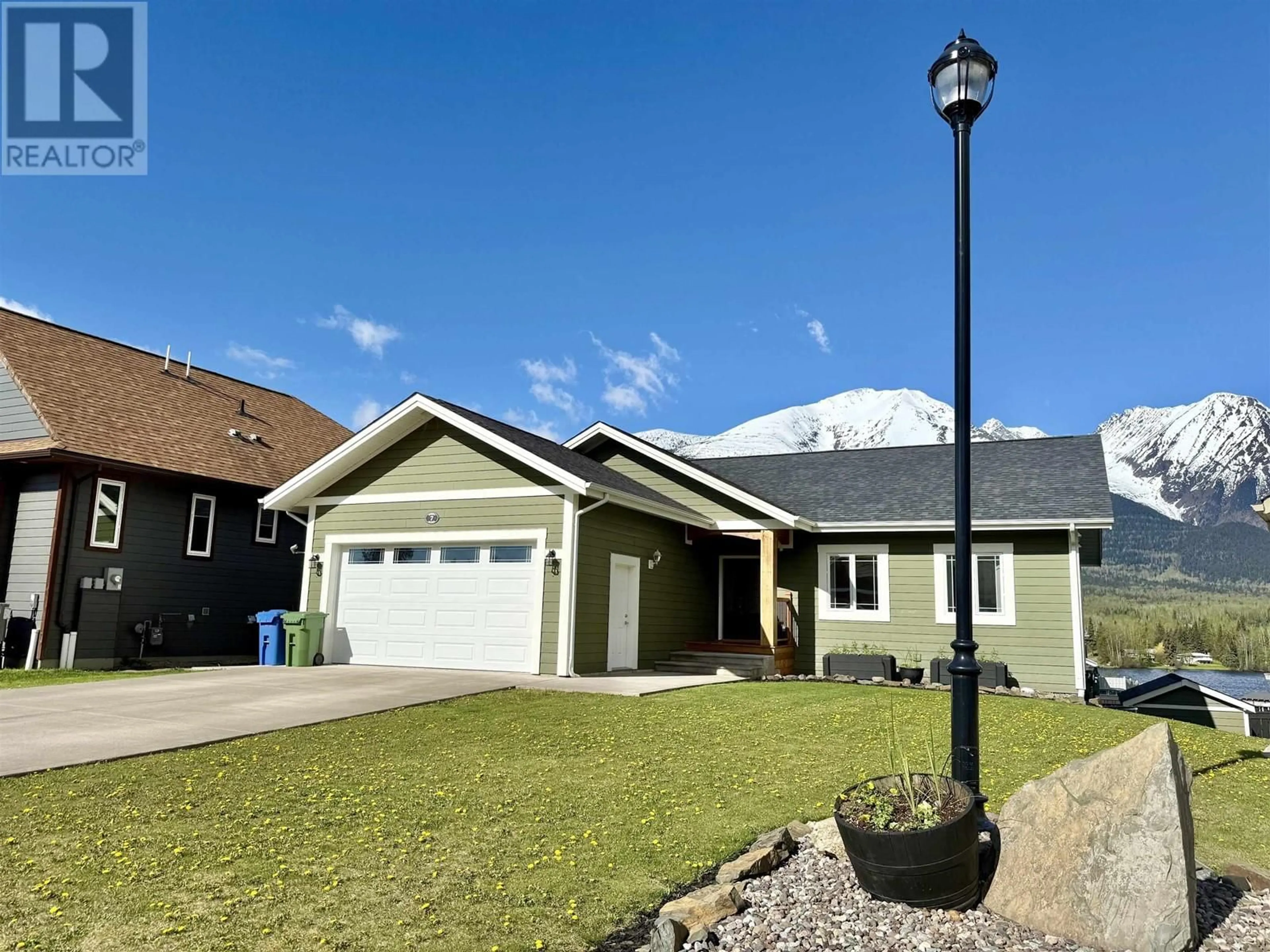 Home with vinyl exterior material, street for 7 AURORA AVENUE, Smithers British Columbia V0J2N2
