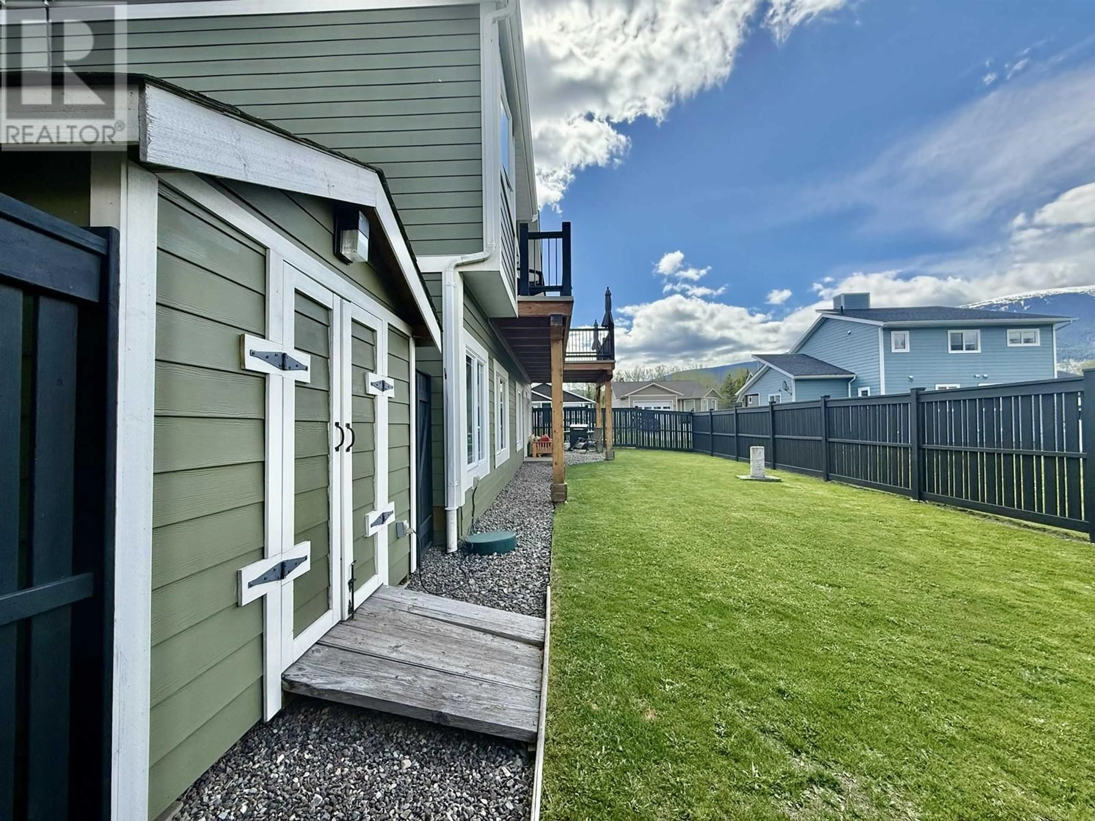A pic from outside/outdoor area/front of a property/back of a property/a pic from drone, mountain view for 7 AURORA AVENUE, Smithers British Columbia V0J2N2