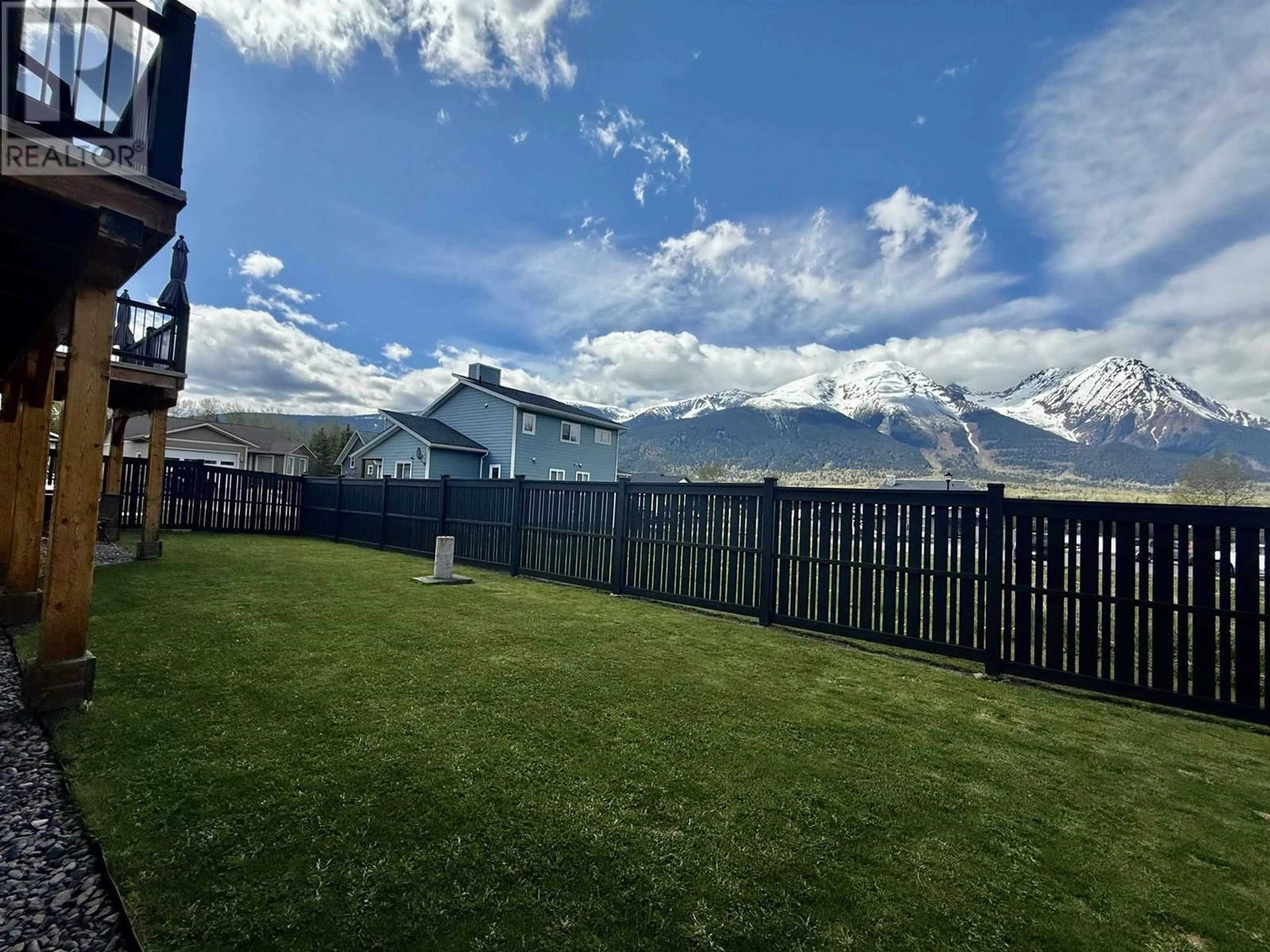 A pic from outside/outdoor area/front of a property/back of a property/a pic from drone, mountain view for 7 AURORA AVENUE, Smithers British Columbia V0J2N2