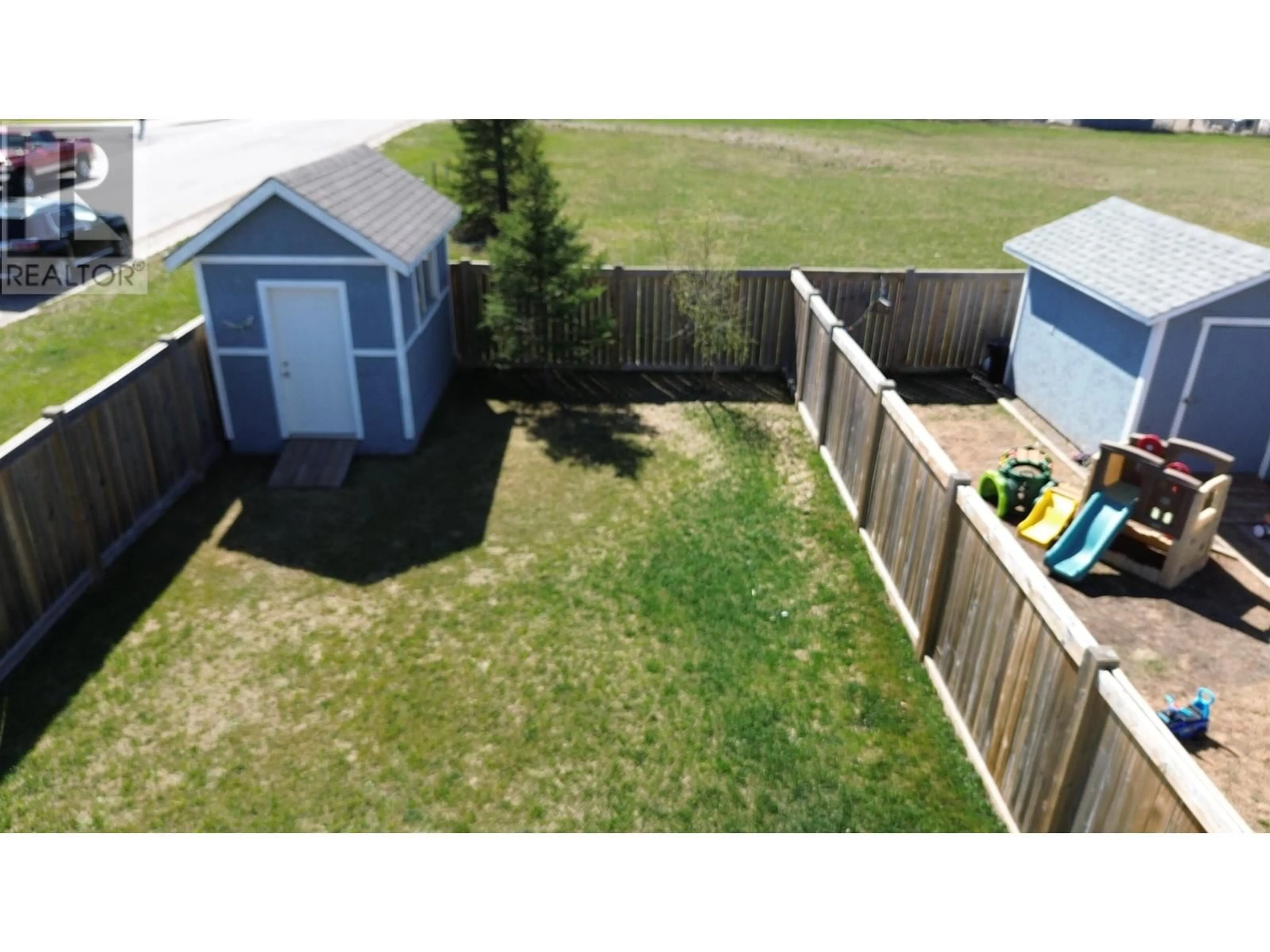 A pic from outside/outdoor area/front of a property/back of a property/a pic from drone, unknown for 9203 102 AVENUE, Fort St. John British Columbia V1J0J9