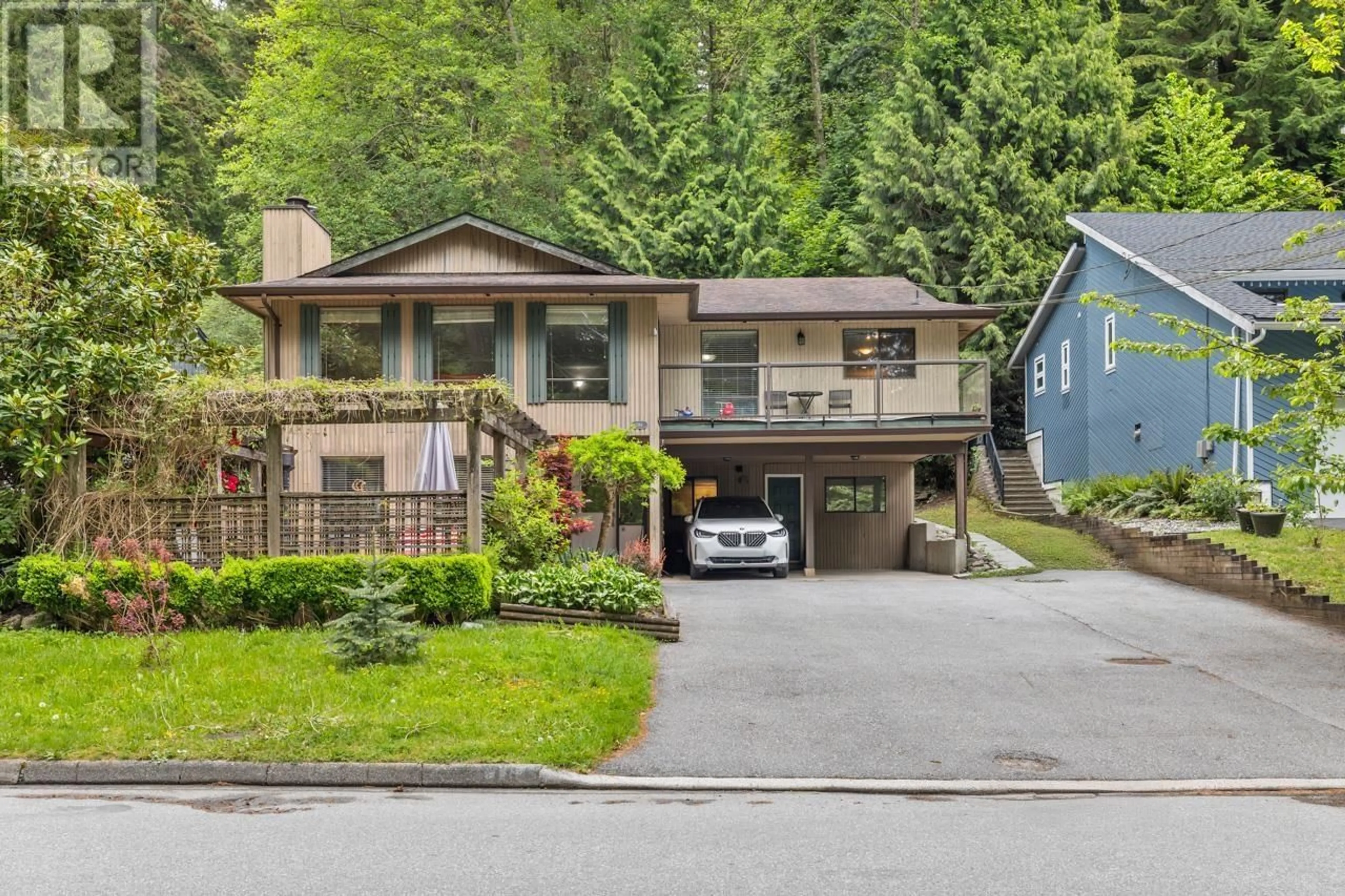 Home with vinyl exterior material, street for 1184 RIVERSIDE DRIVE, North Vancouver British Columbia V7H1V5