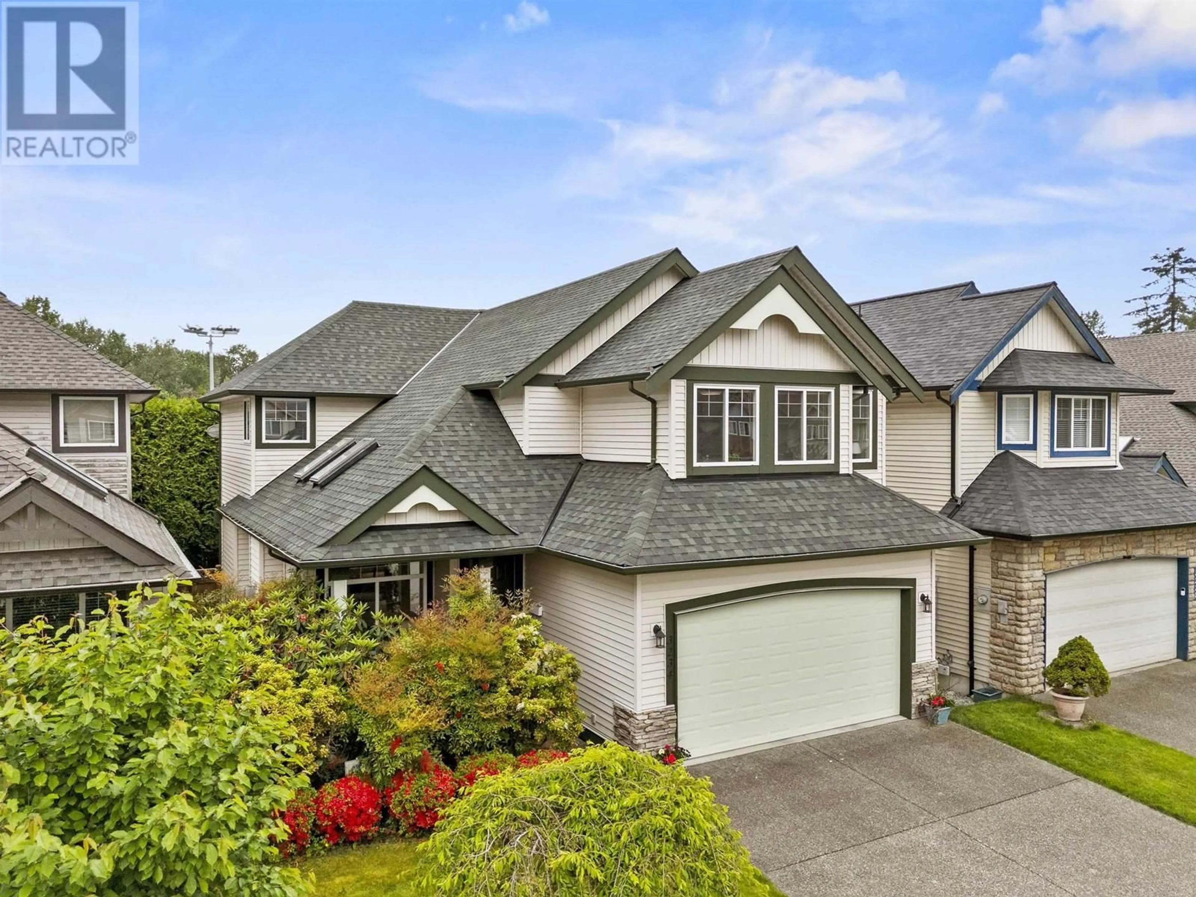 Home with vinyl exterior material, street for 3234 OSBORNE STREET, Port Coquitlam British Columbia V3B8C8