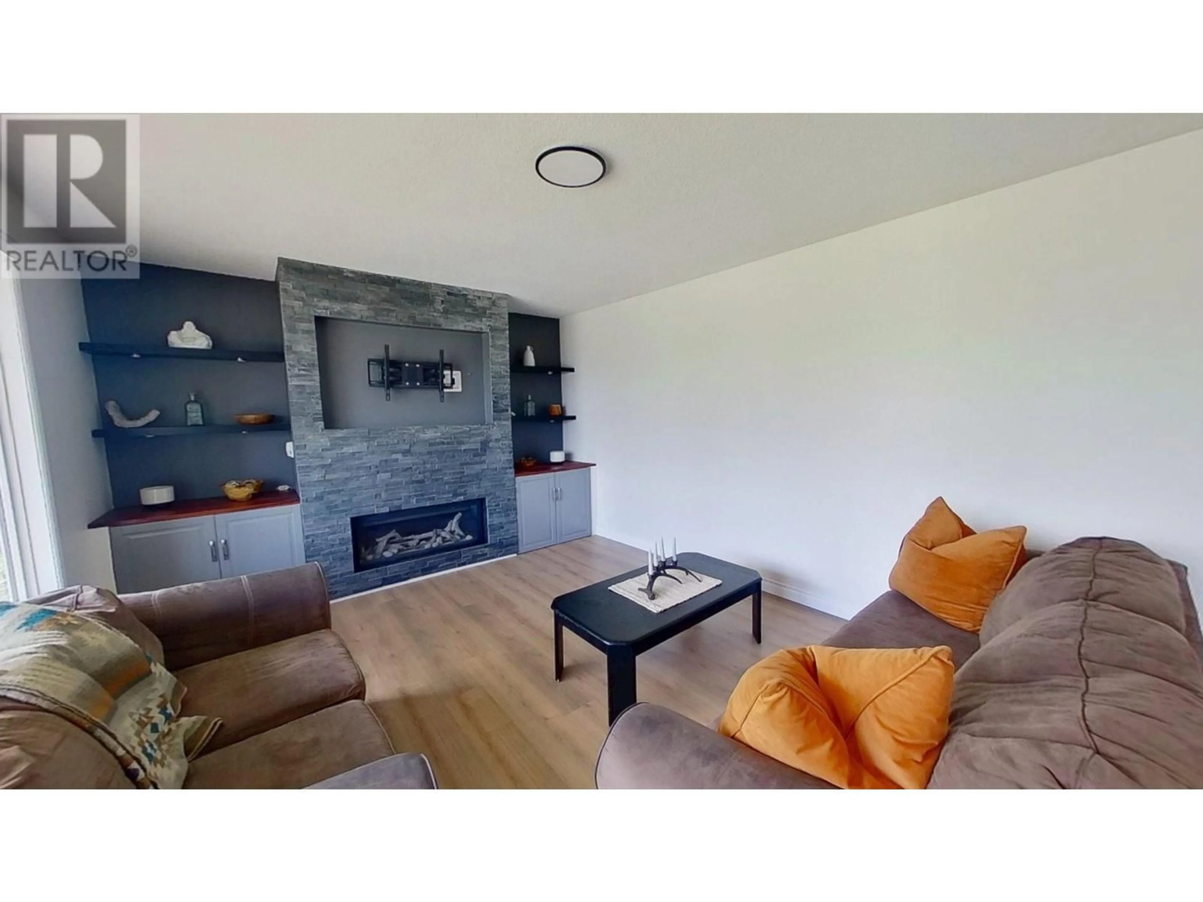 Living room with furniture, unknown for 9008 105 AVENUE, Fort St. John British Columbia V1J2L4