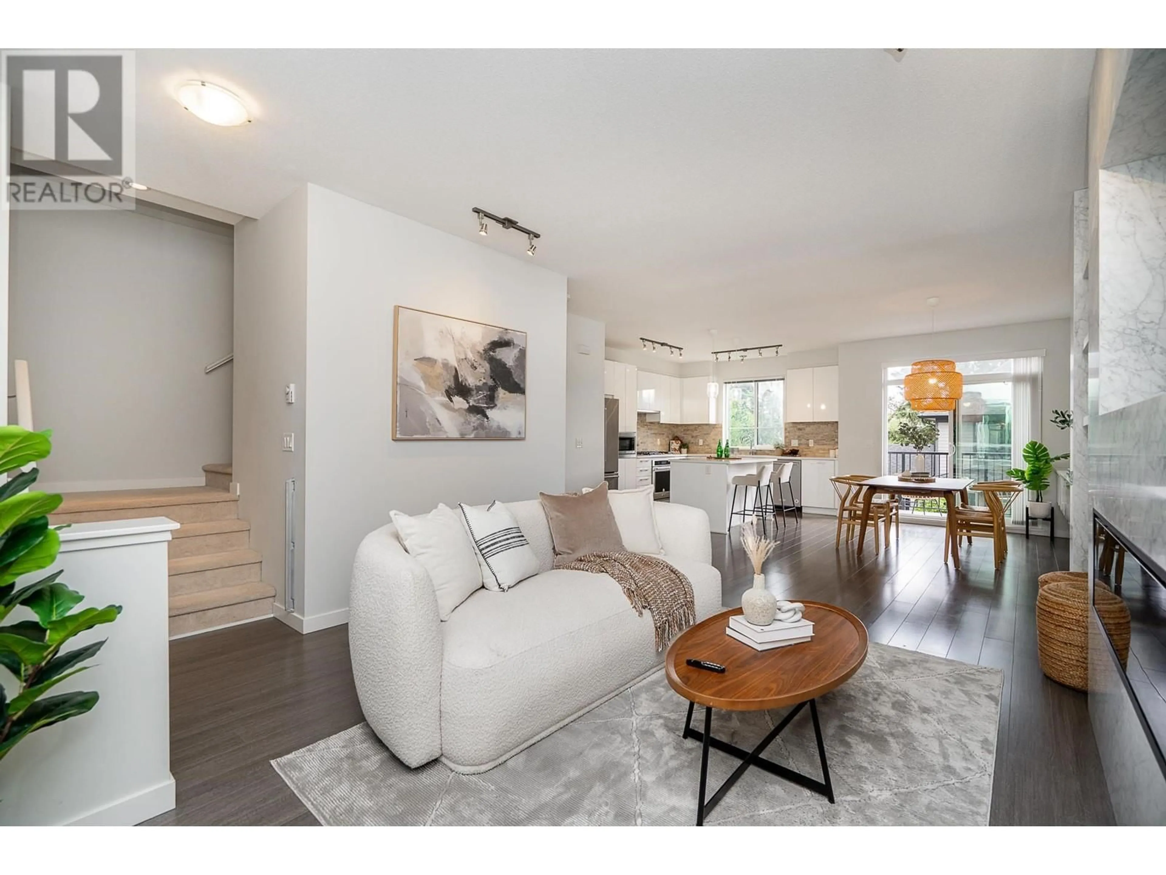 Living room with furniture, unknown for 140 - 3500 BURKE VILLAGE PROMENADE, Coquitlam British Columbia V3E0N2