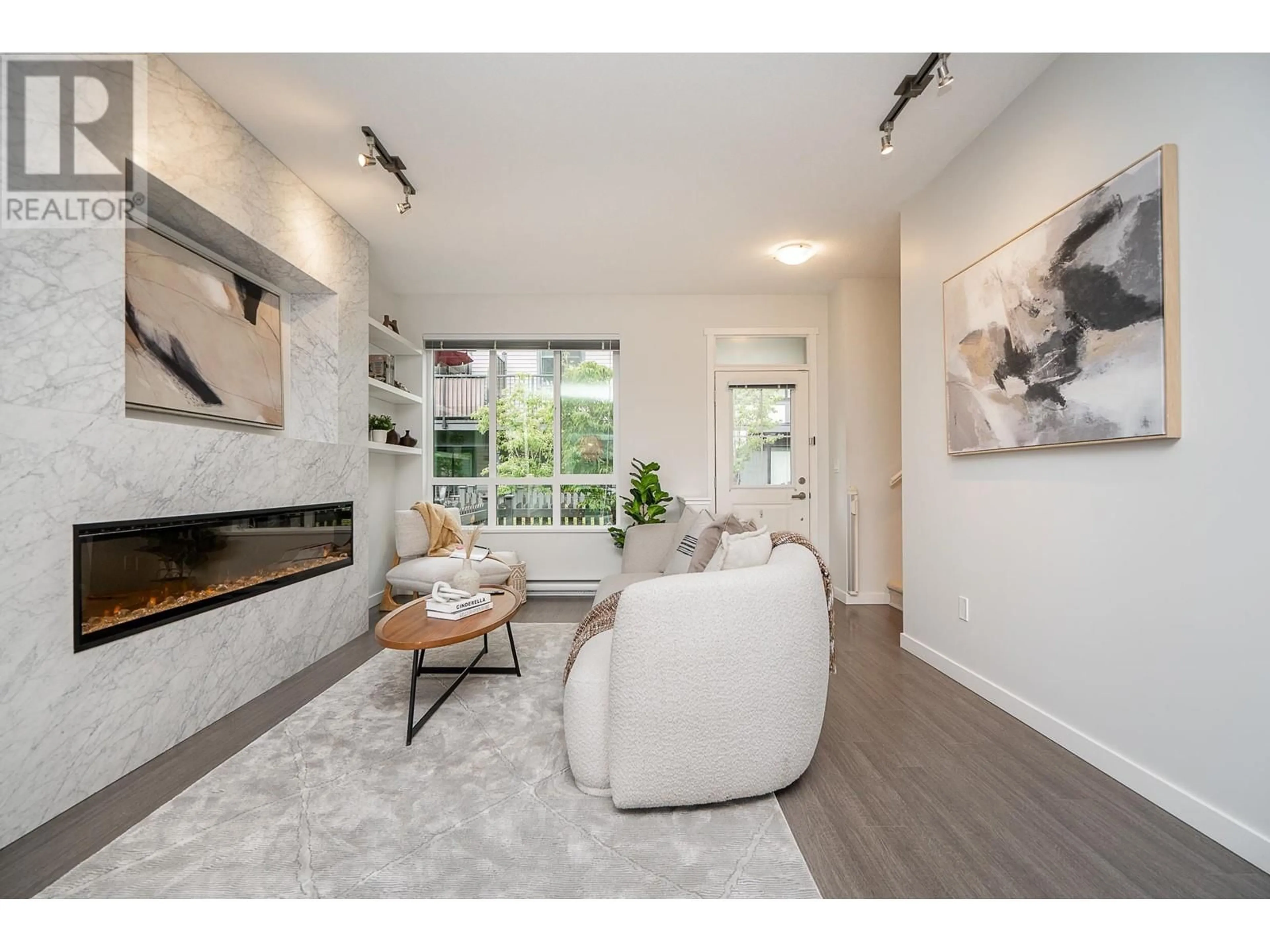 Living room with furniture, unknown for 140 - 3500 BURKE VILLAGE PROMENADE, Coquitlam British Columbia V3E0N2