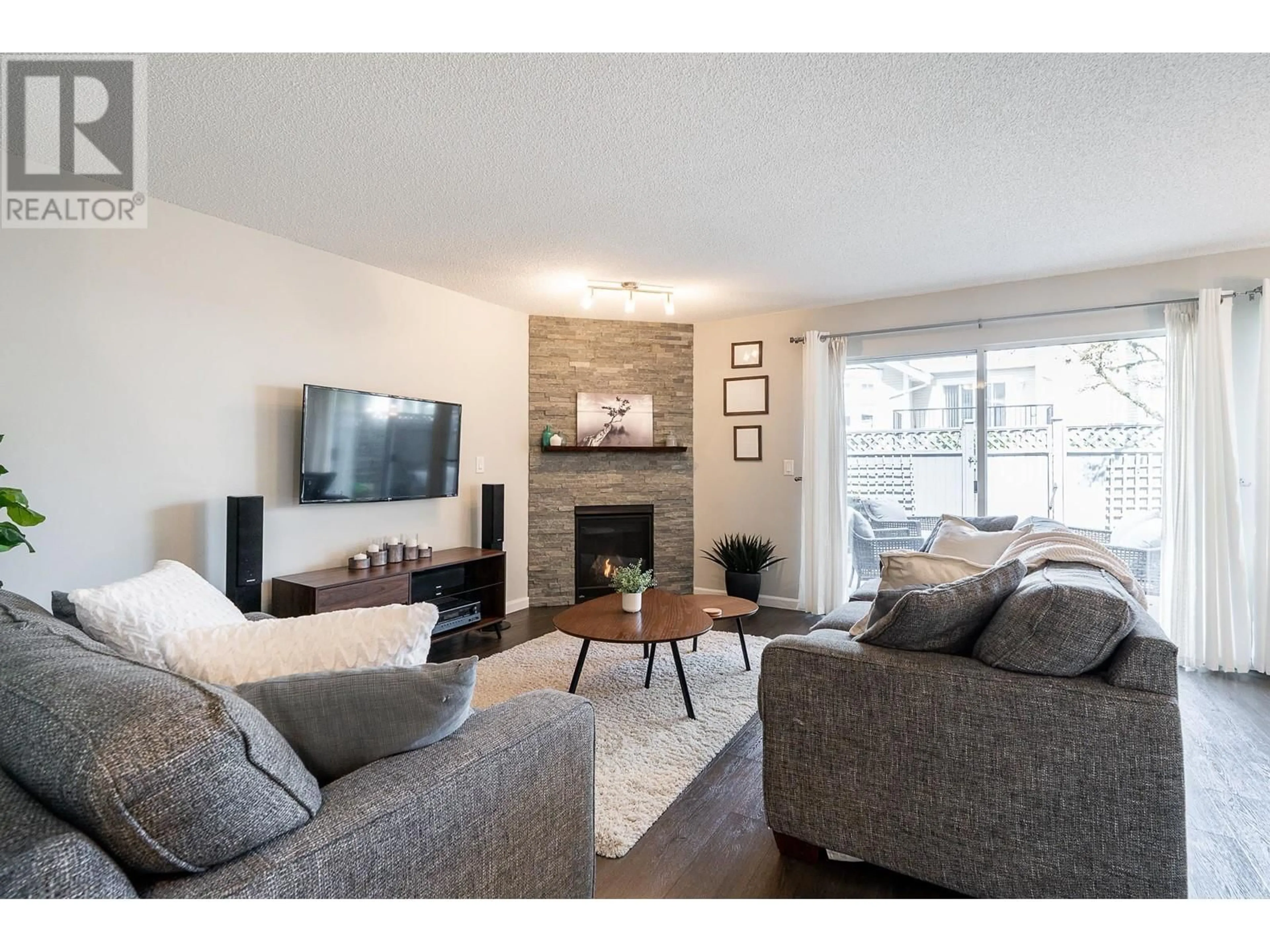 Living room with furniture, wood/laminate floor for 18 - 2561 RUNNEL DRIVE, Coquitlam British Columbia V3E2S3