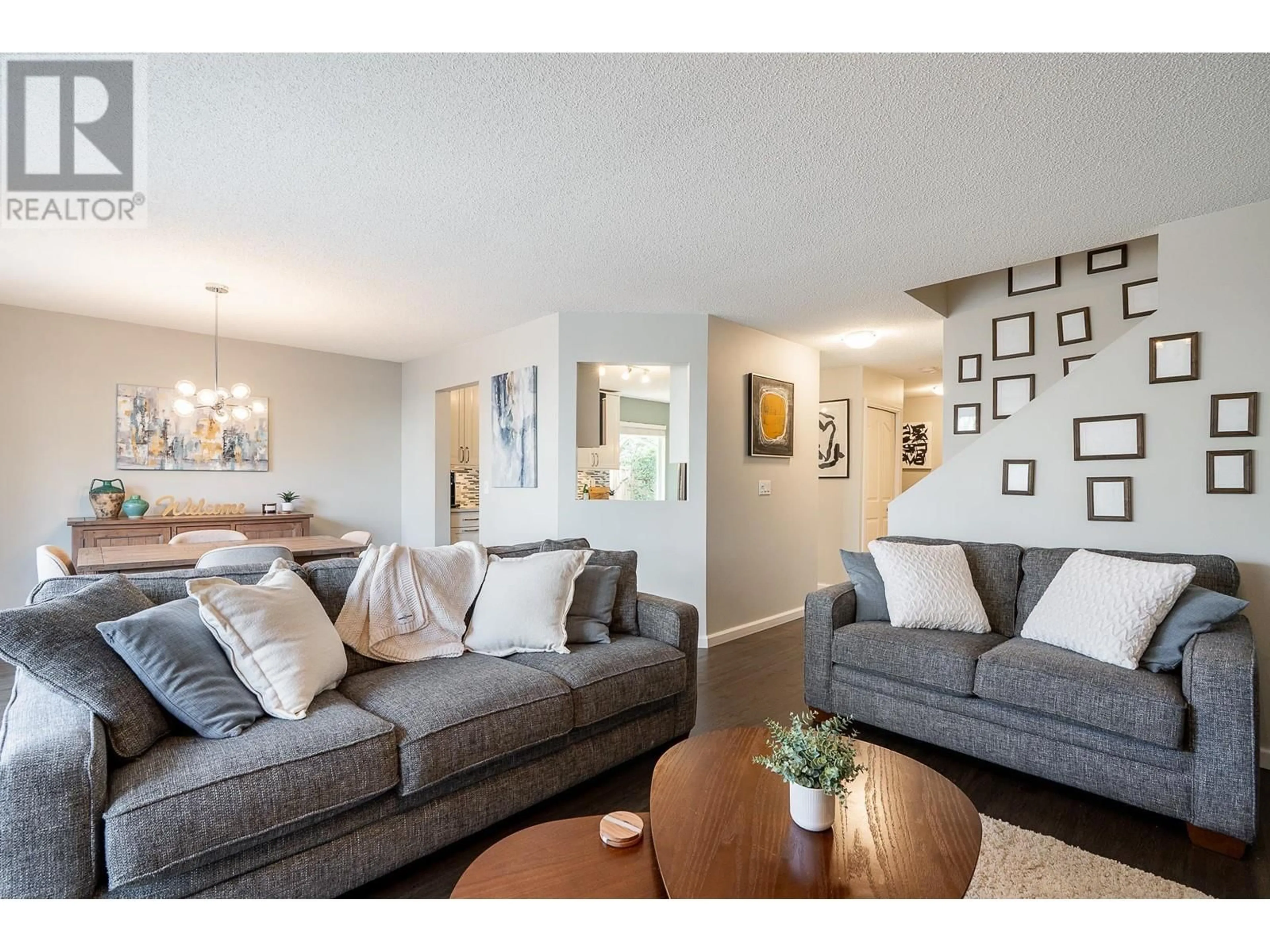 Living room with furniture, wood/laminate floor for 18 - 2561 RUNNEL DRIVE, Coquitlam British Columbia V3E2S3