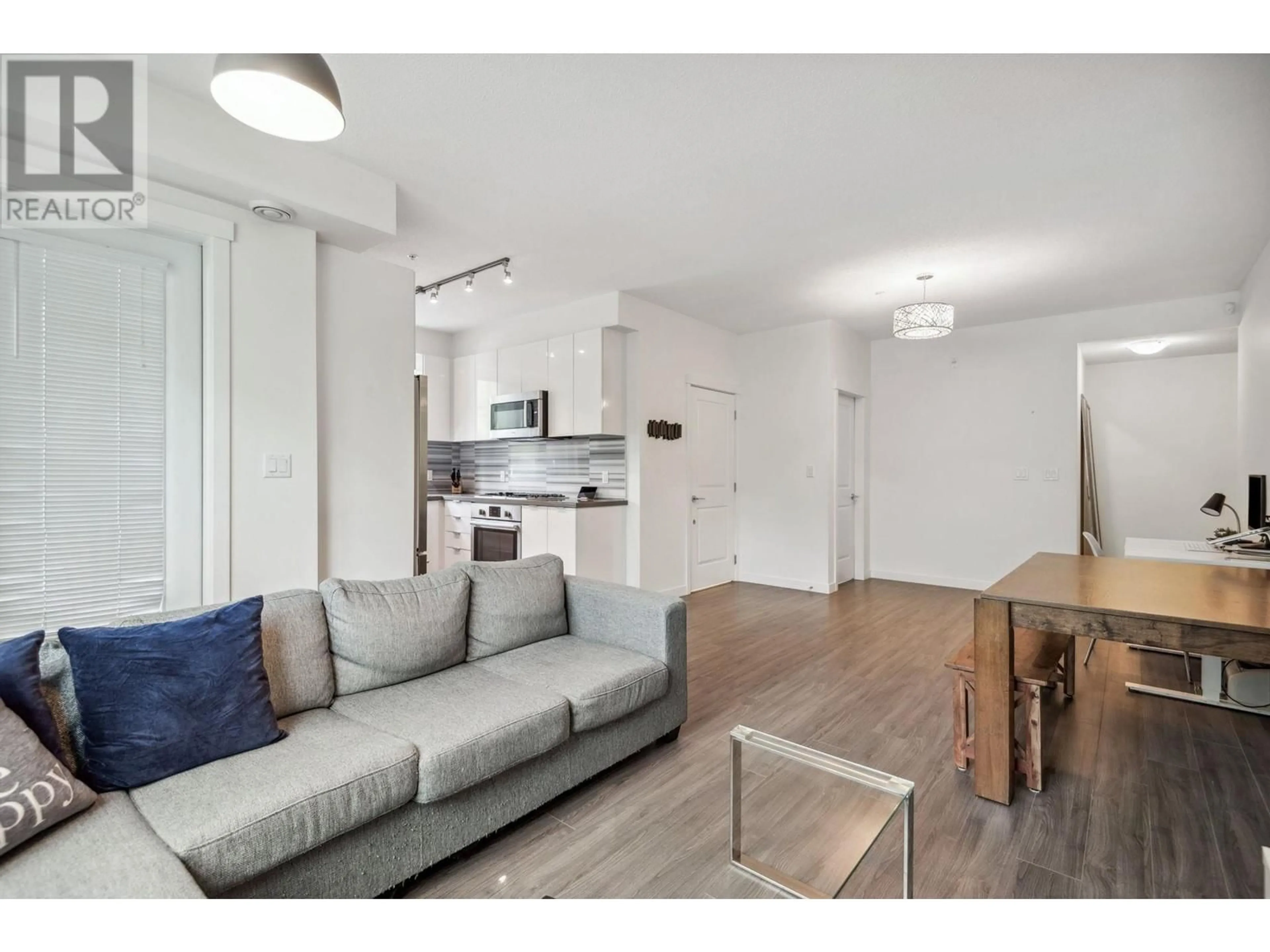 Living room with furniture, unknown for 107 - 3138 RIVERWALK AVENUE, Vancouver British Columbia V5S0A6