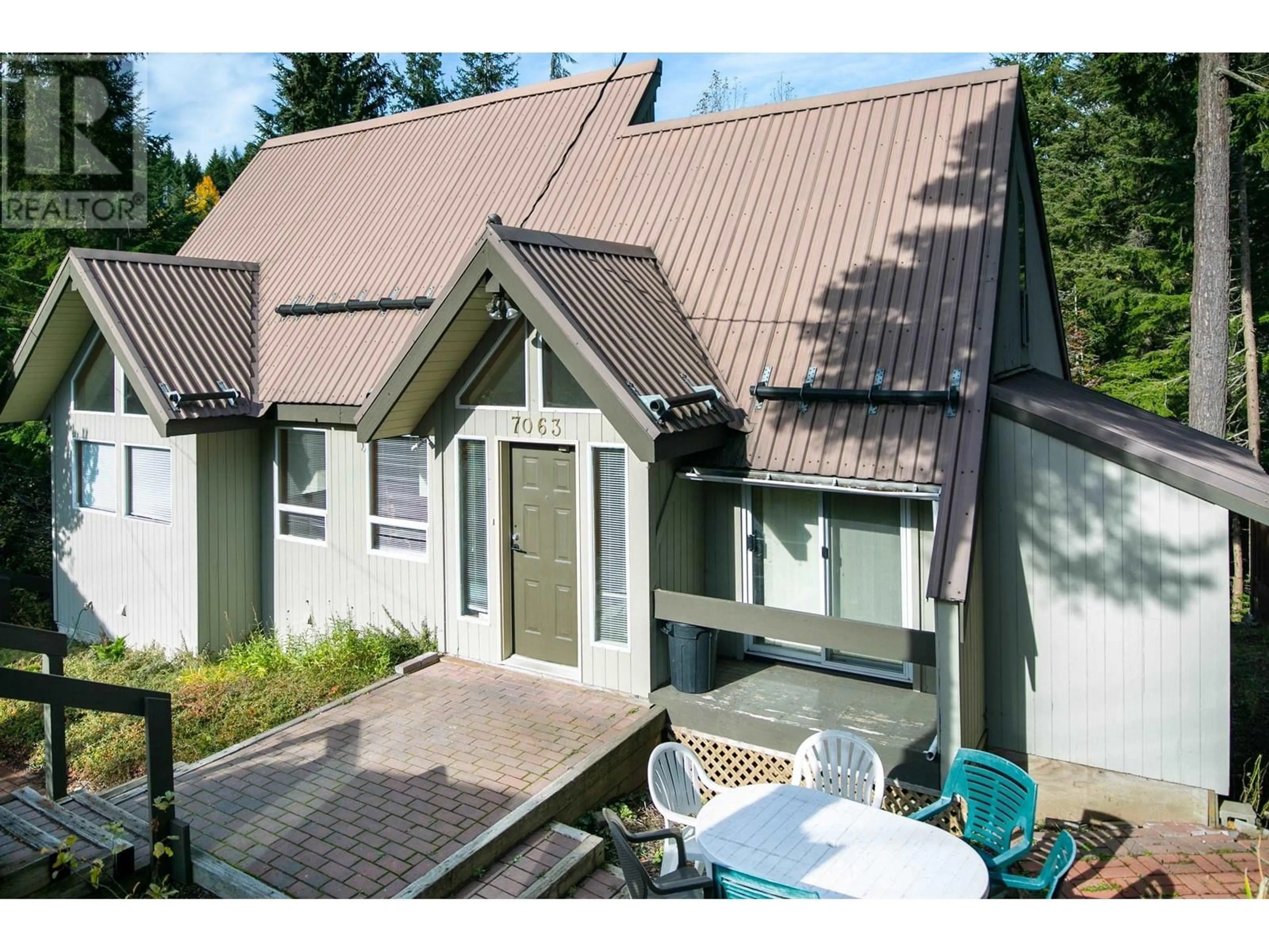 A pic from outside/outdoor area/front of a property/back of a property/a pic from drone, street for 7063 NESTERS ROAD, Whistler British Columbia V8E0E2