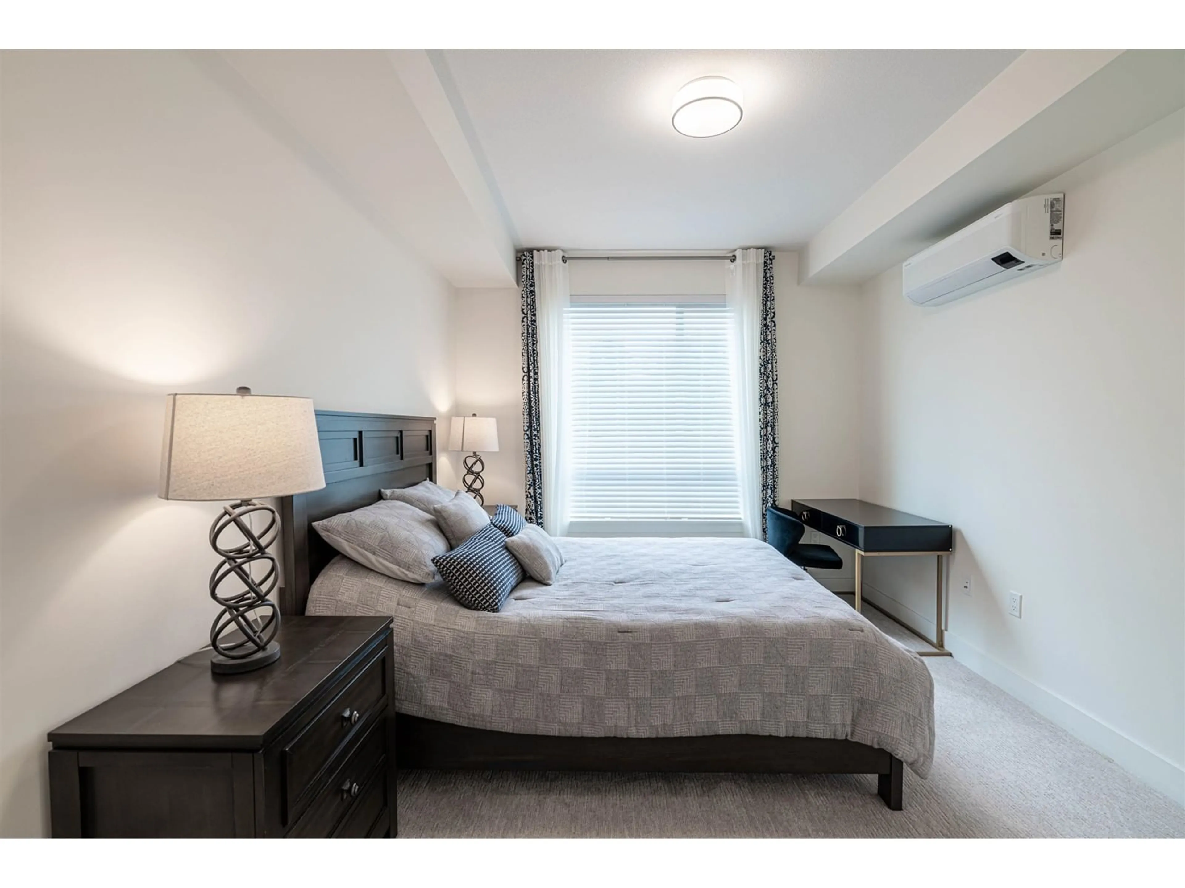 Bedroom with bed, unknown for 211 - 7506 199A, Langley British Columbia V2Y3K9