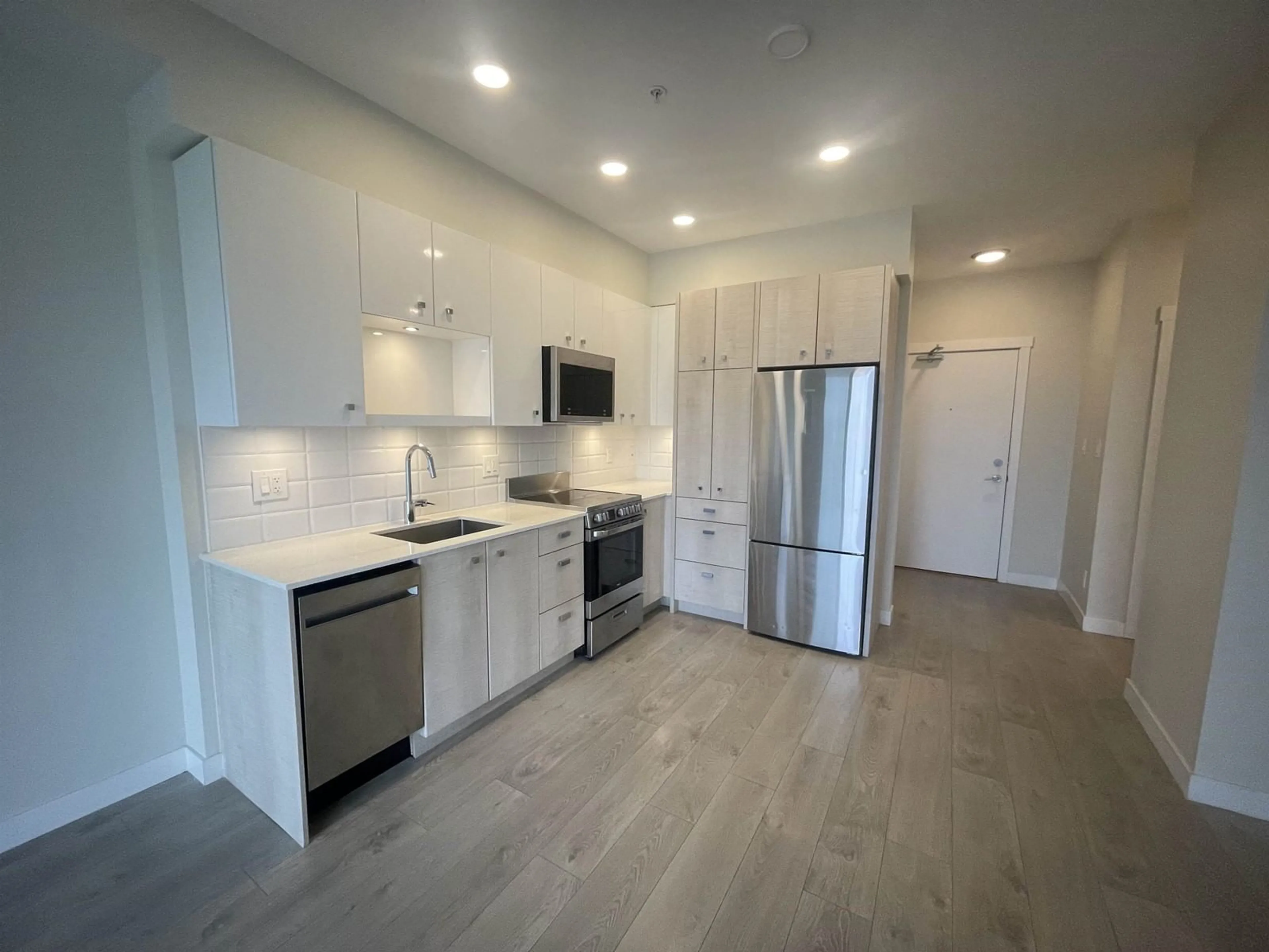 Open concept kitchen, unknown for 207 - 10838 WHALLEY, Surrey British Columbia V3R0G8