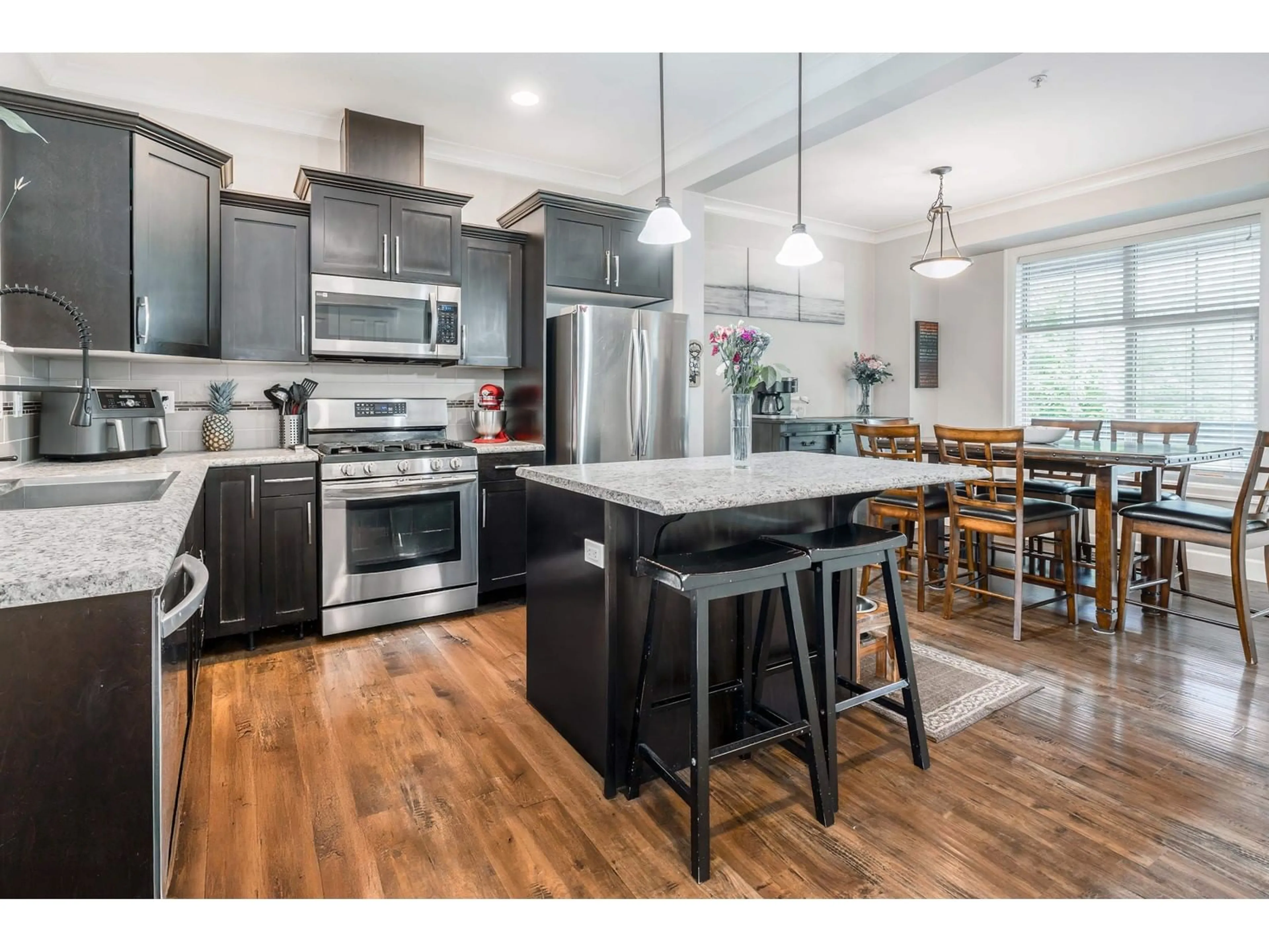 Open concept kitchen, wood/laminate floor for 9 - 45025 WOLFE ROAD, Chilliwack British Columbia V2P7V9