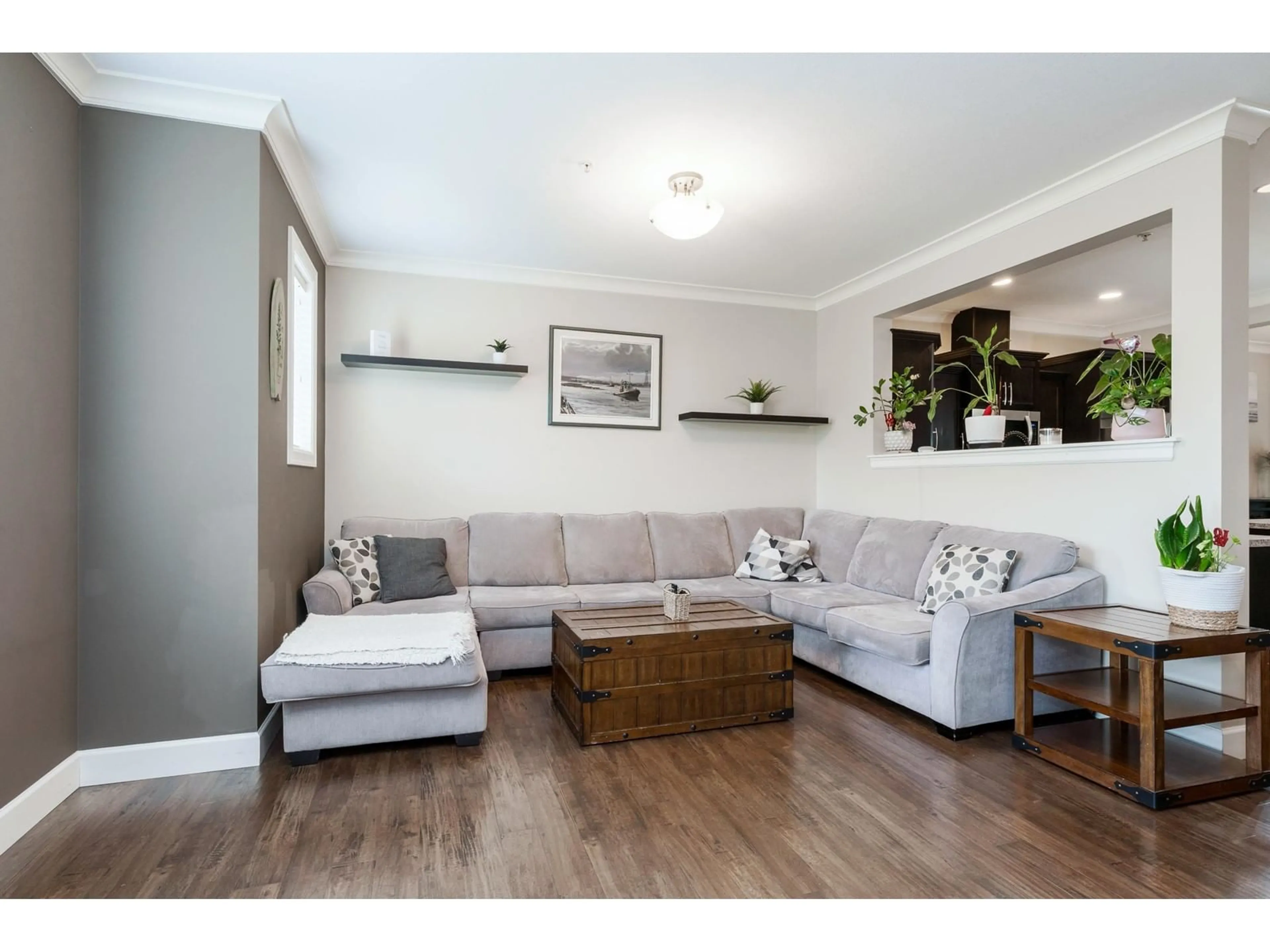Living room with furniture, wood/laminate floor for 9 - 45025 WOLFE ROAD, Chilliwack British Columbia V2P7V9