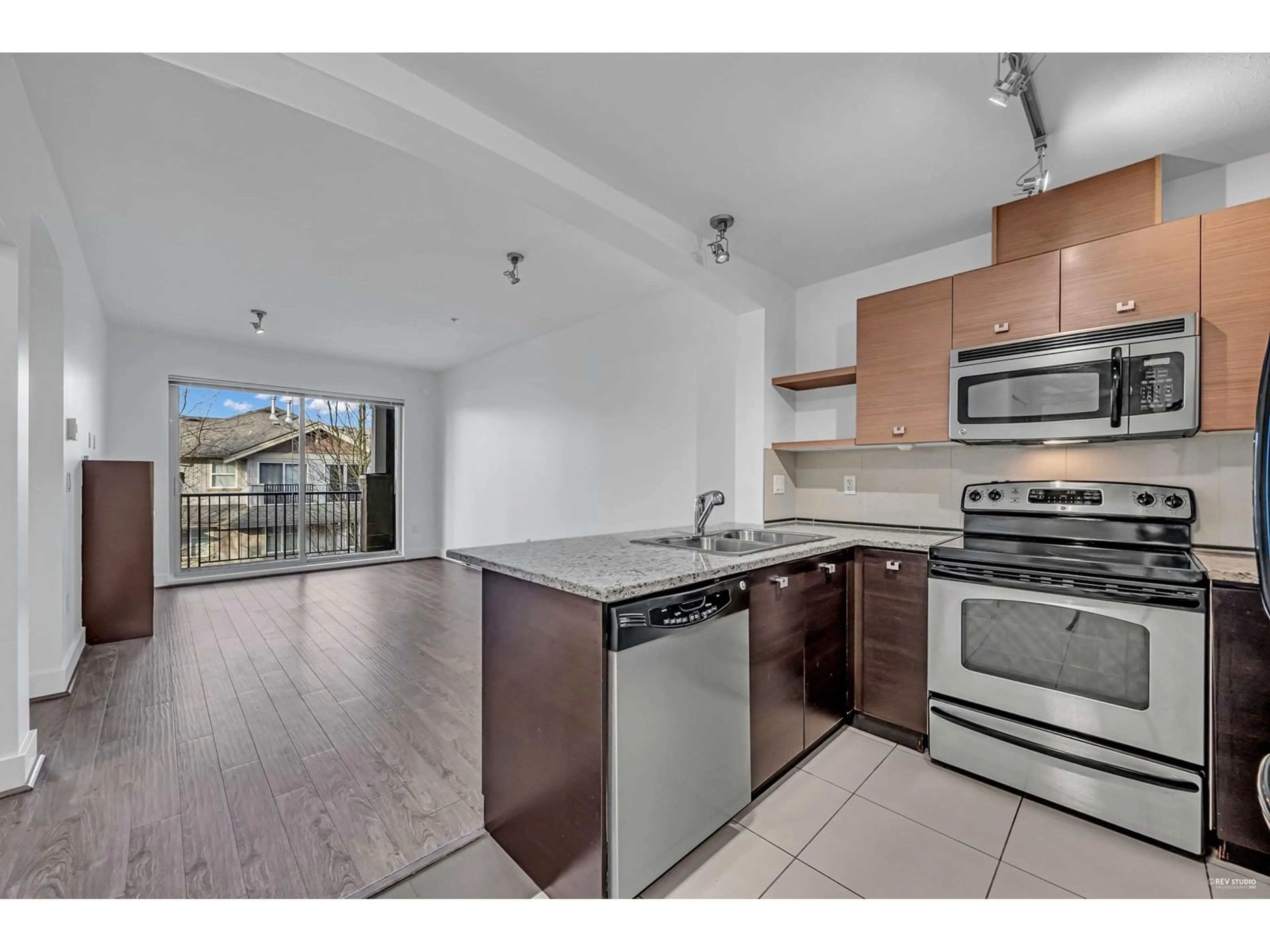 Open concept kitchen, unknown for 320 - 6688 120, Surrey British Columbia V3W1T8