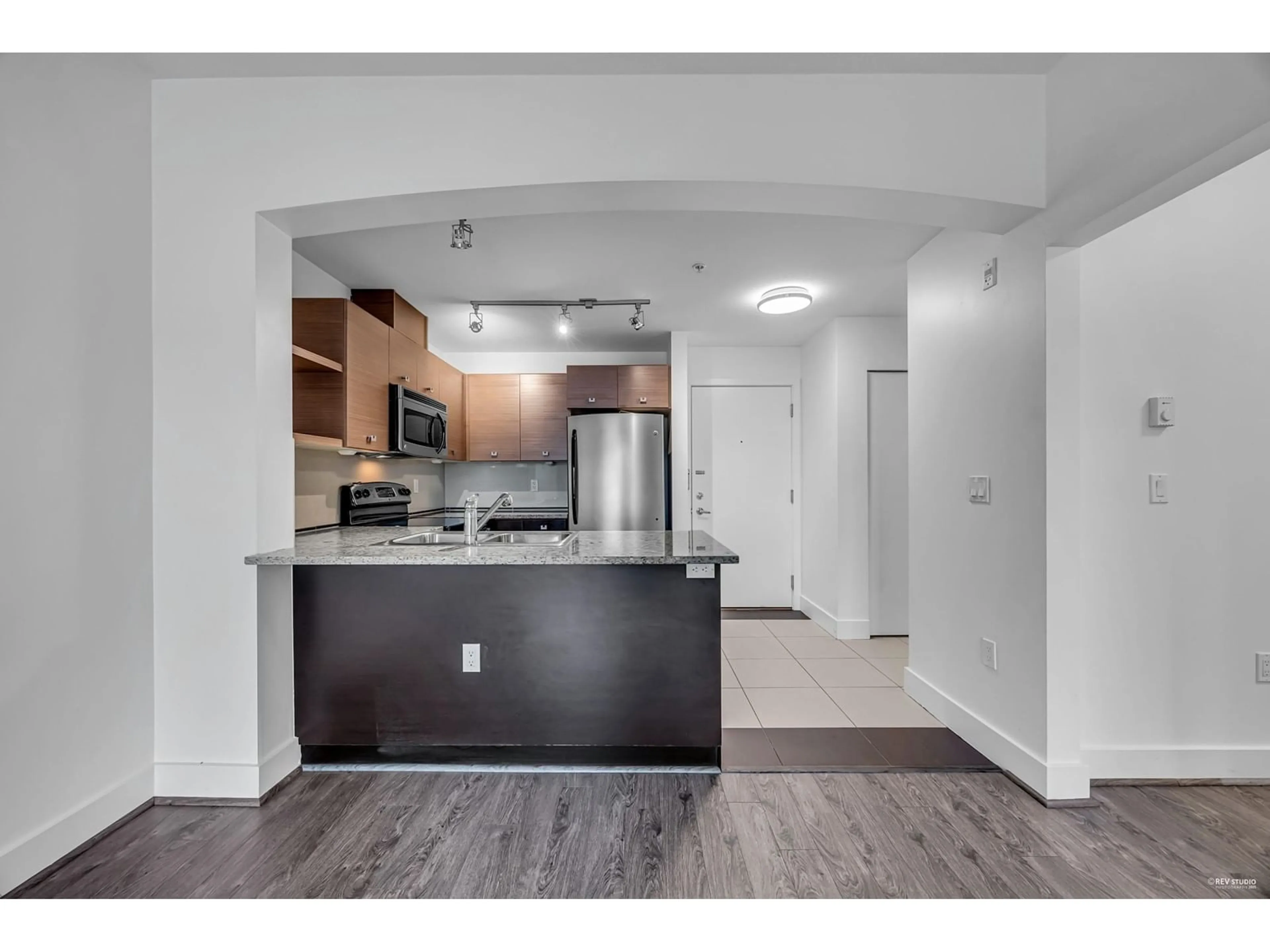 Open concept kitchen, unknown for 320 - 6688 120, Surrey British Columbia V3W1T8