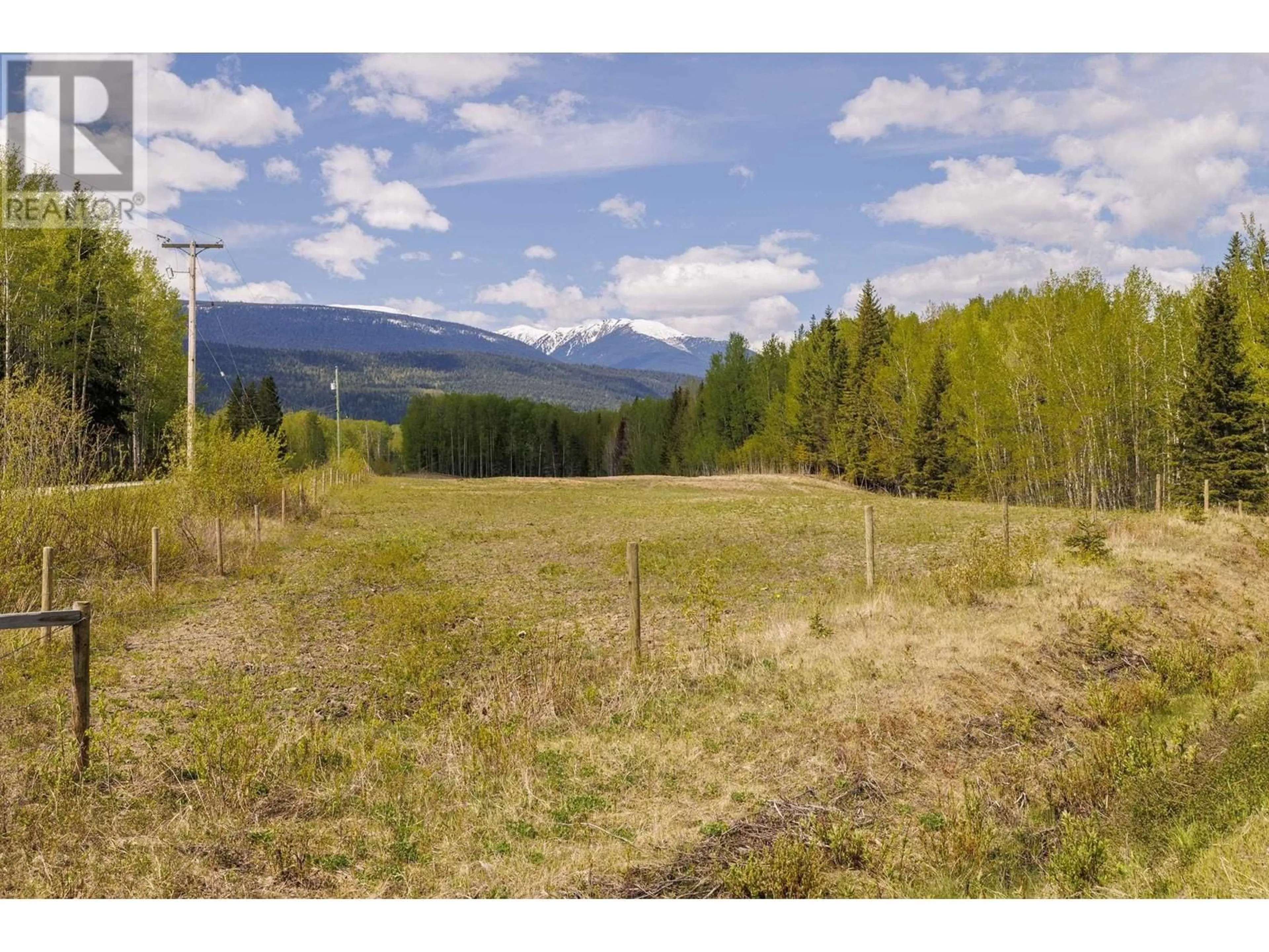 A pic from outside/outdoor area/front of a property/back of a property/a pic from drone, mountain view for 3019 WESTLUND ROAD, McBride British Columbia V0J2E0