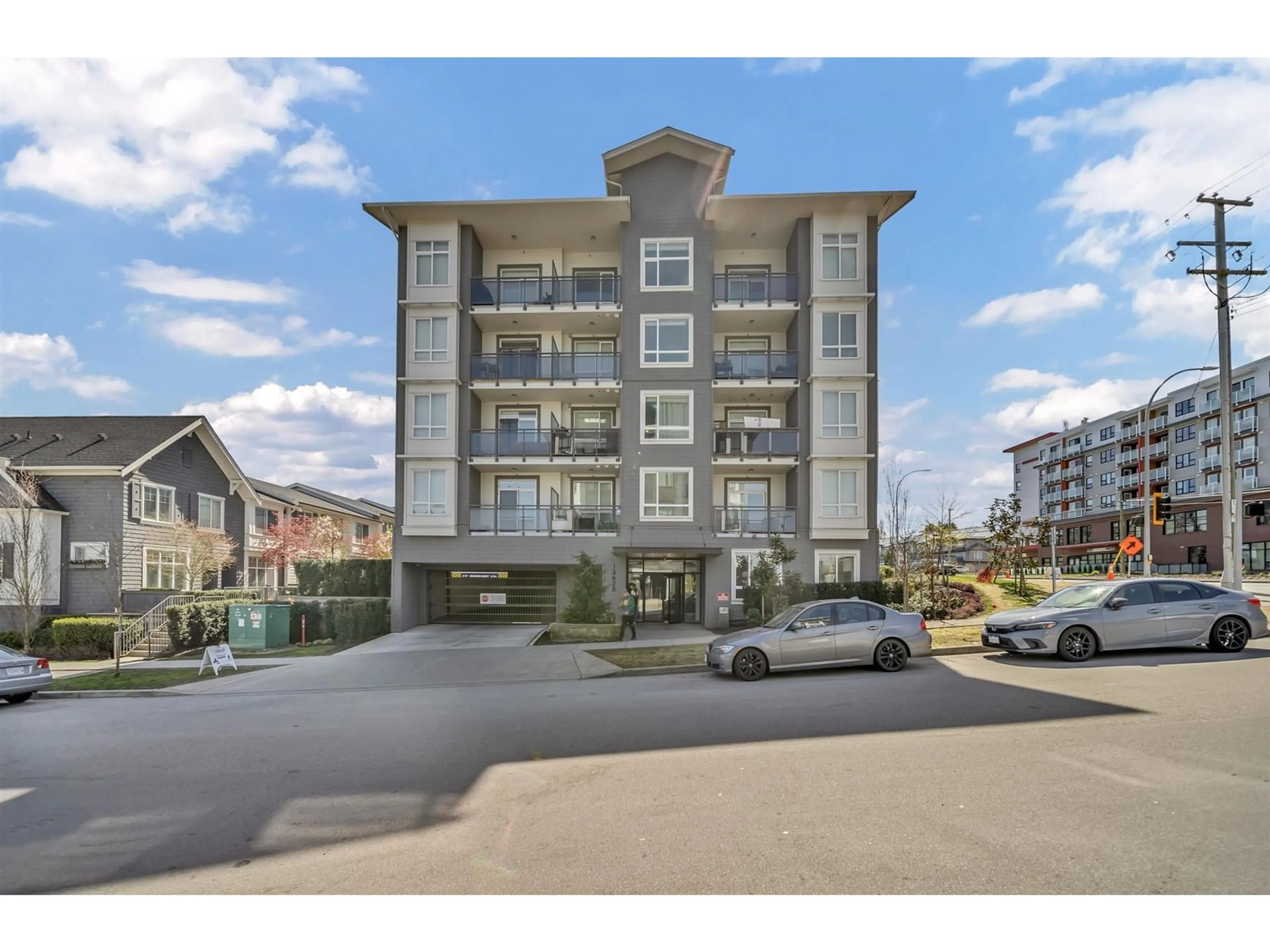 A pic from outside/outdoor area/front of a property/back of a property/a pic from drone, unknown for 314 - 13628 81A, Surrey British Columbia V3W3E2