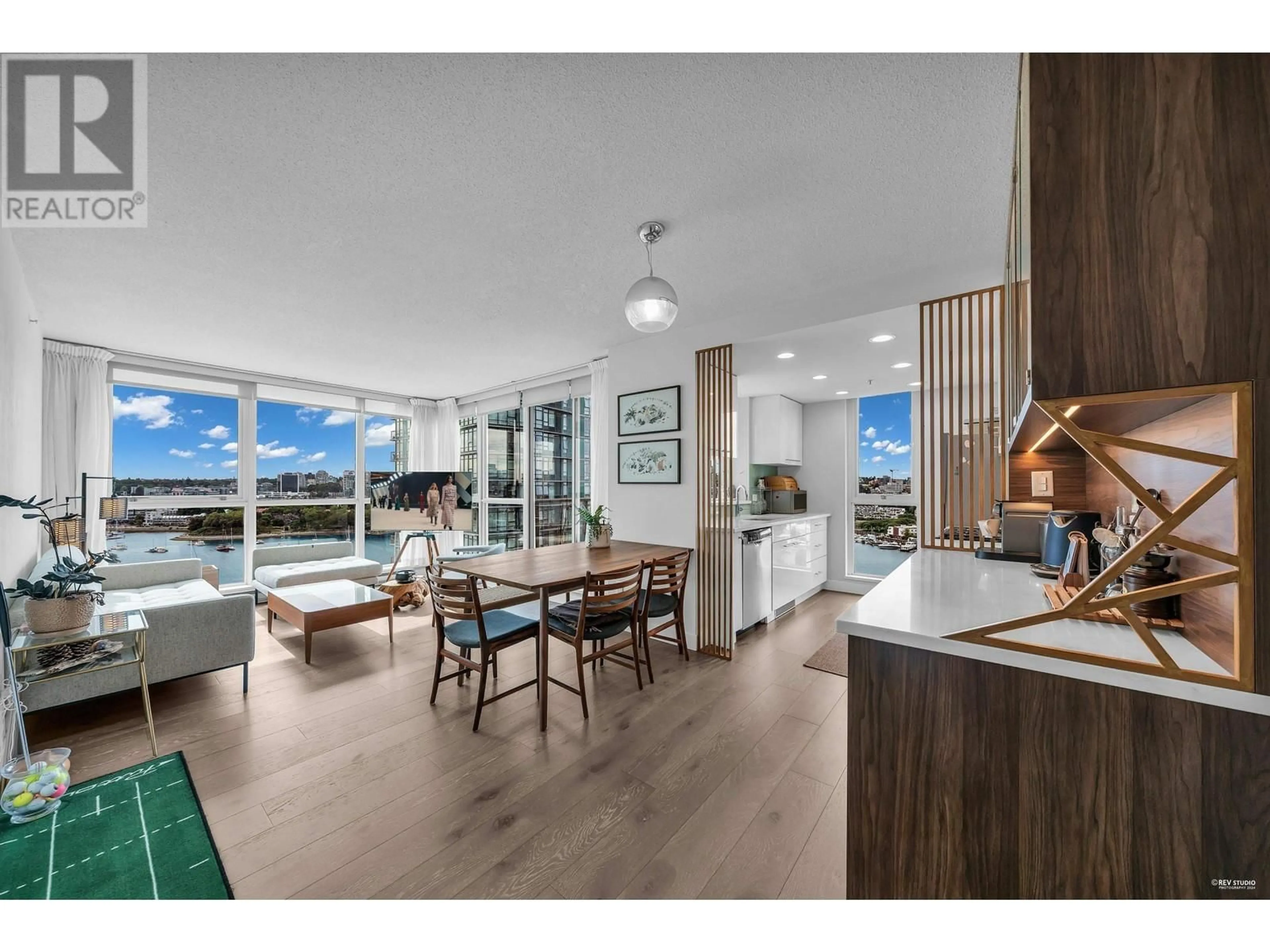 Open concept kitchen, wood/laminate floor for 1802 - 1408 STRATHMORE MEWS, Vancouver British Columbia V6Z3A9