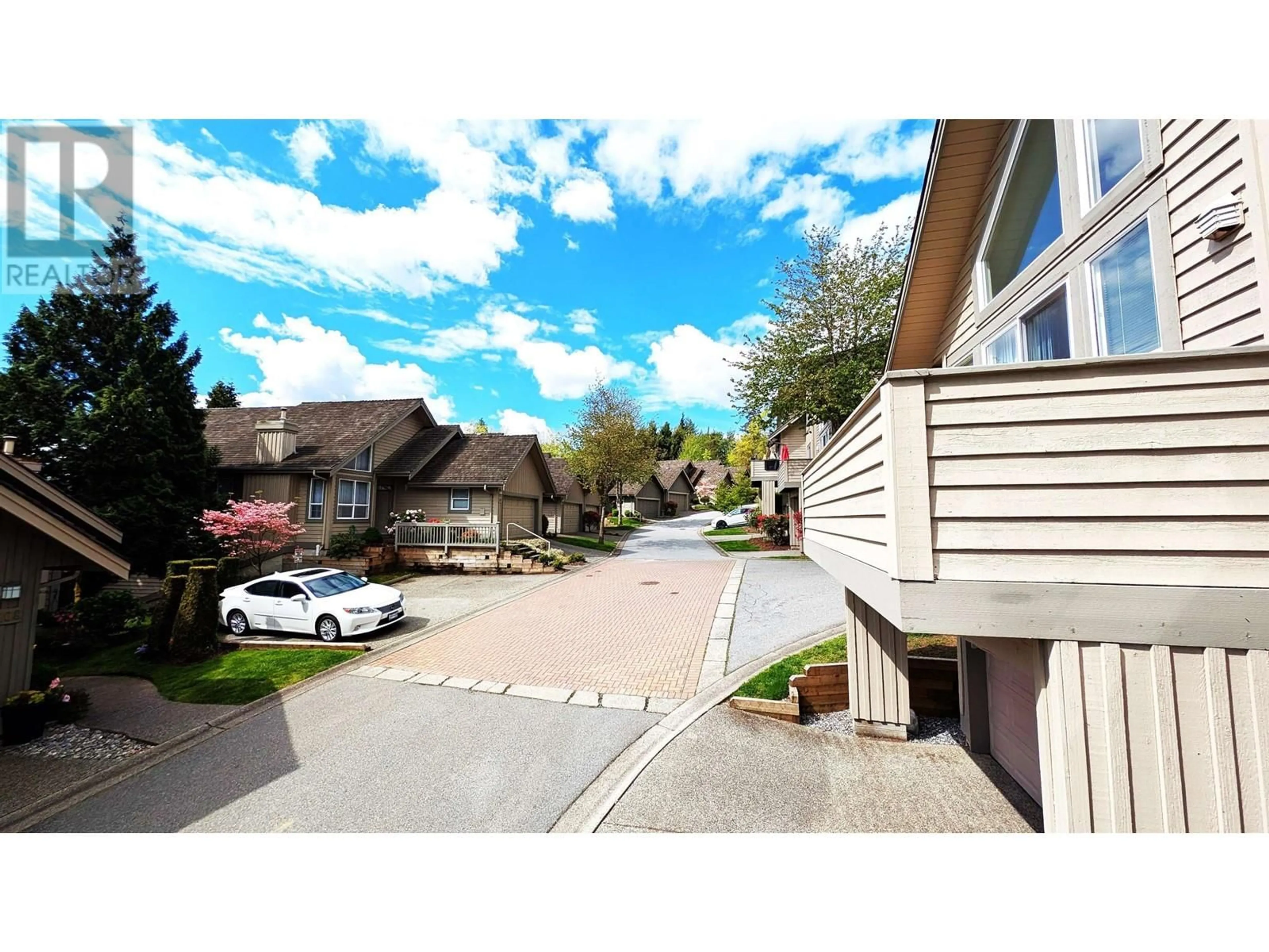 A pic from outside/outdoor area/front of a property/back of a property/a pic from drone, street for 209 - 1465 PARKWAY BOULEVARD, Coquitlam British Columbia V3E3E6