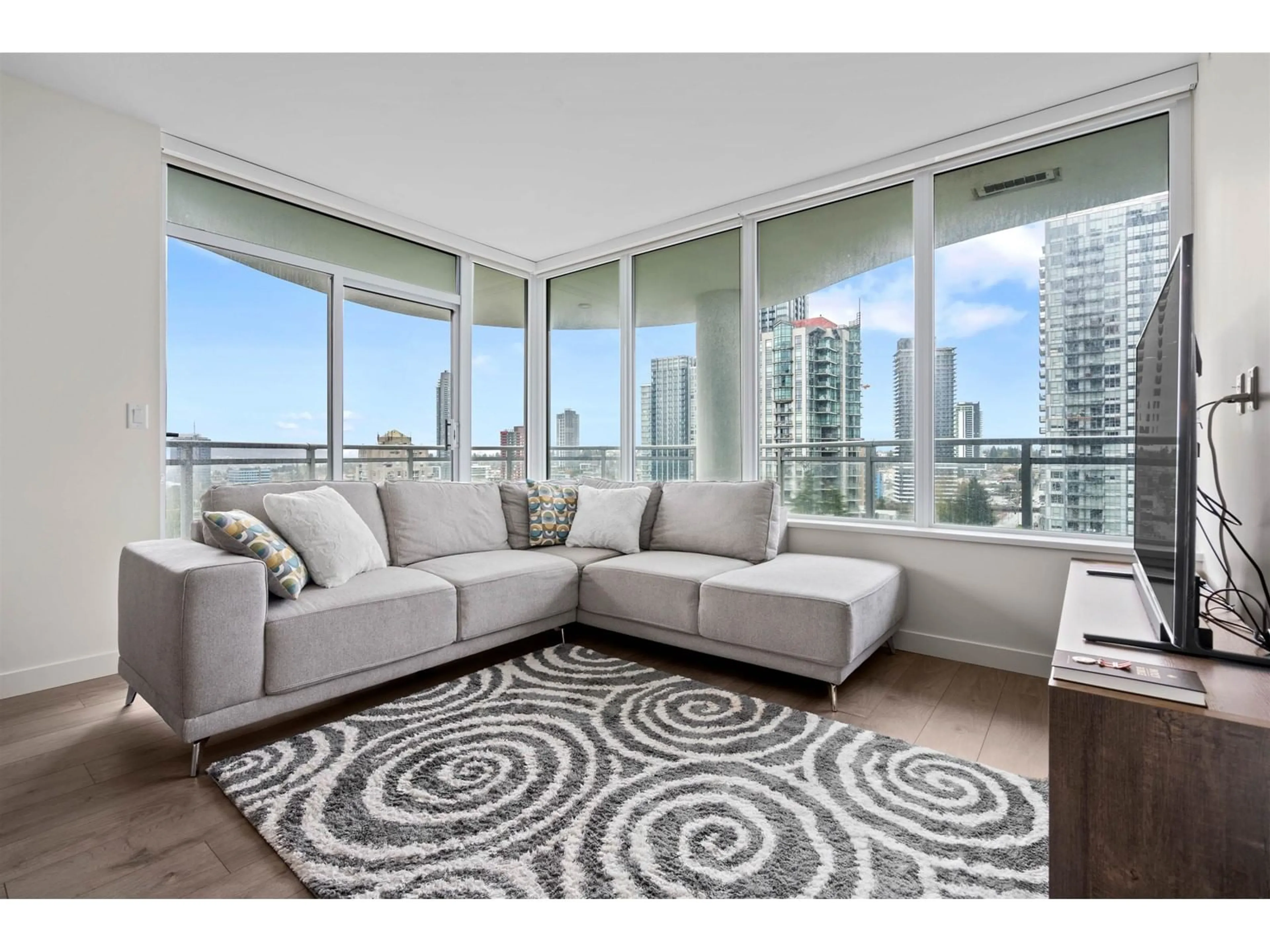 Living room with furniture, carpet floor for 1203 - 13318 104, Surrey British Columbia V3T0R2