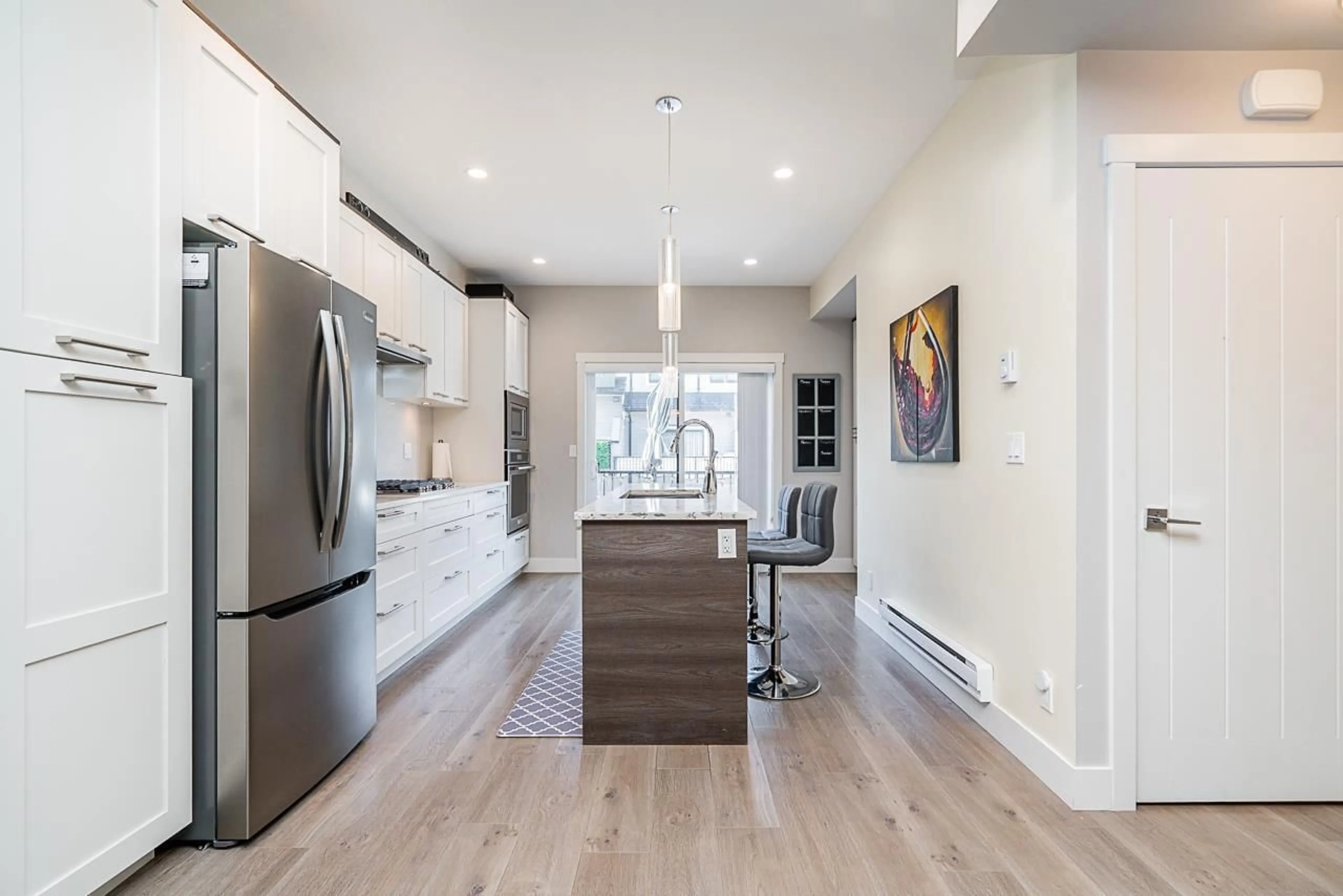 Contemporary kitchen, wood/laminate floor for 11 - 2888 156, Surrey British Columbia V3Z0C7
