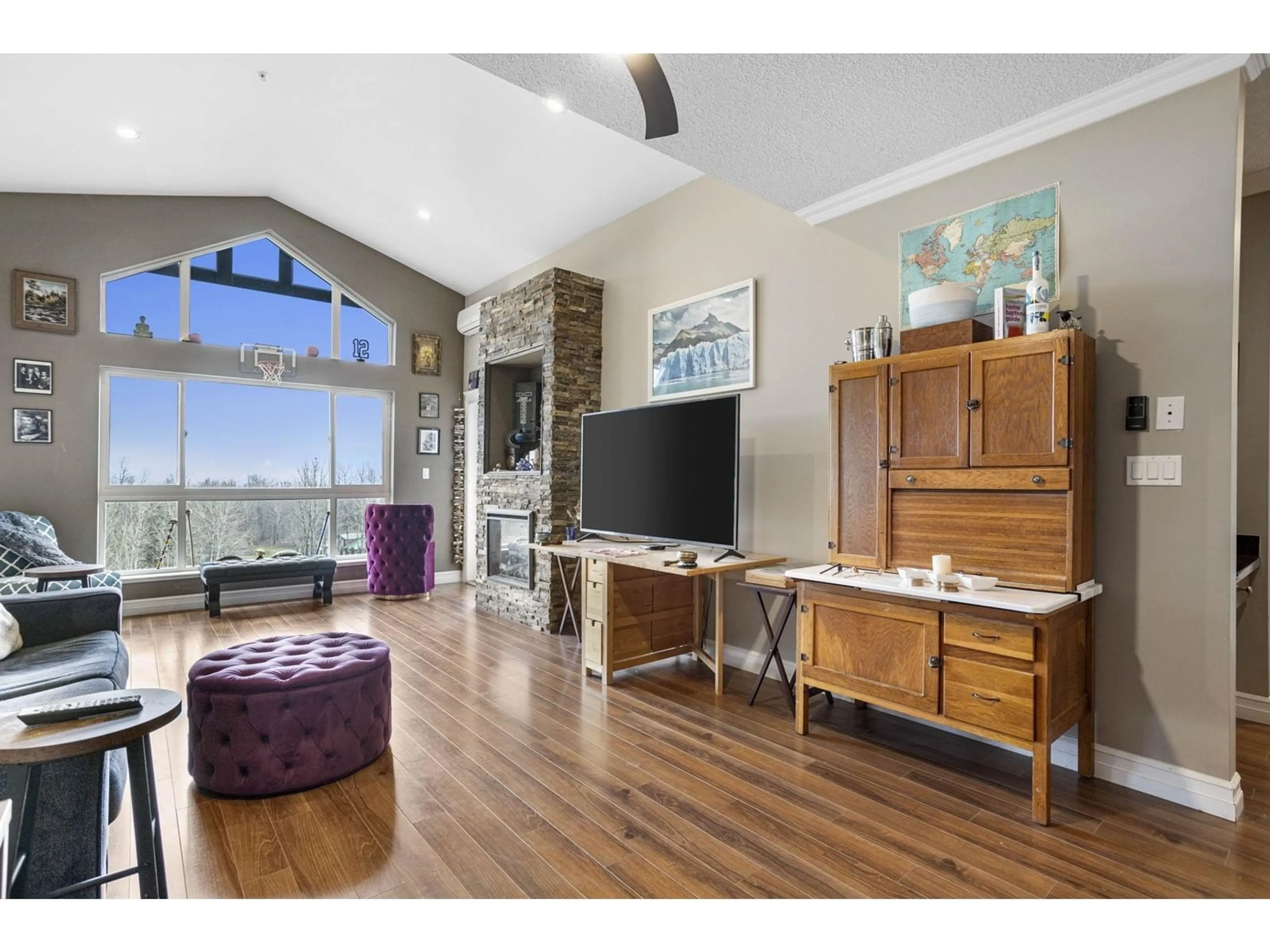 Living room with furniture, wood/laminate floor for B305 - 33755 7TH, Mission British Columbia V2V0A4