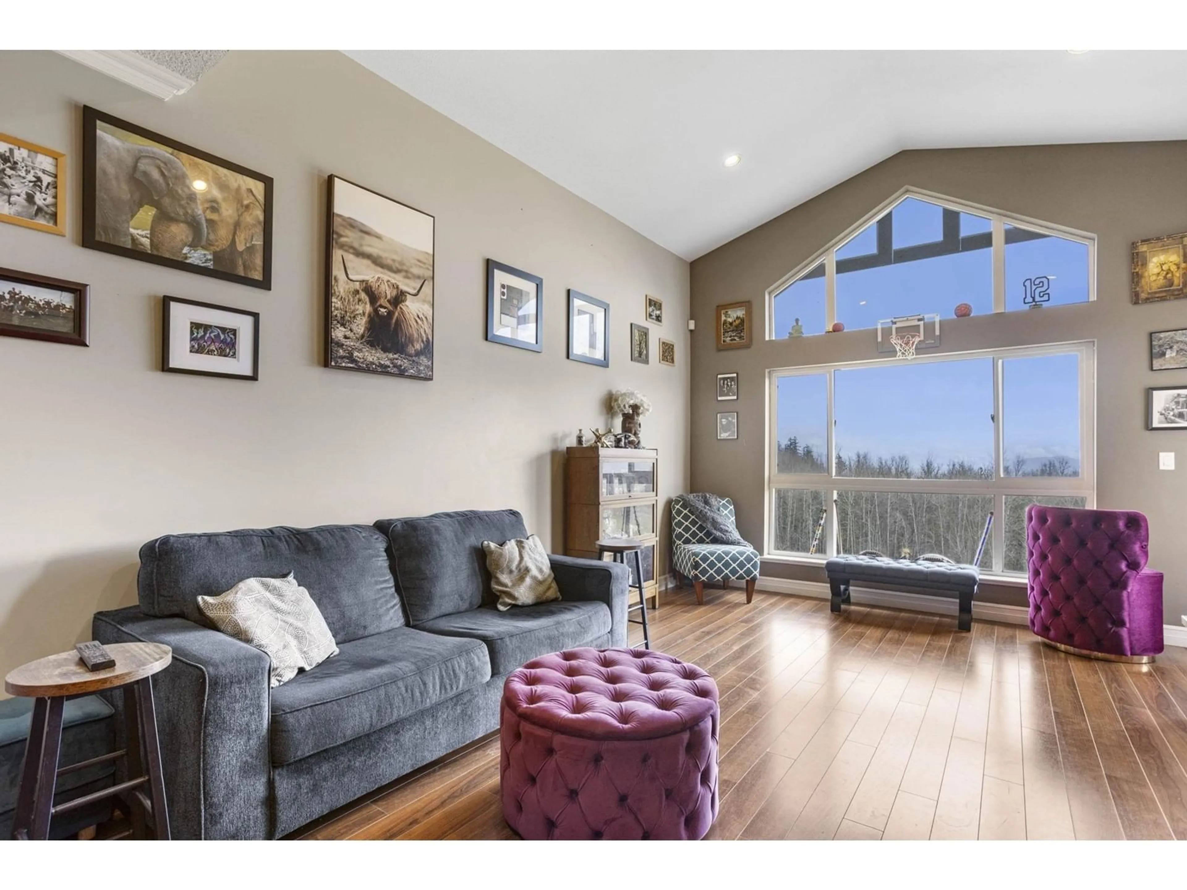 Living room with furniture, wood/laminate floor for B305 - 33755 7TH, Mission British Columbia V2V0A4