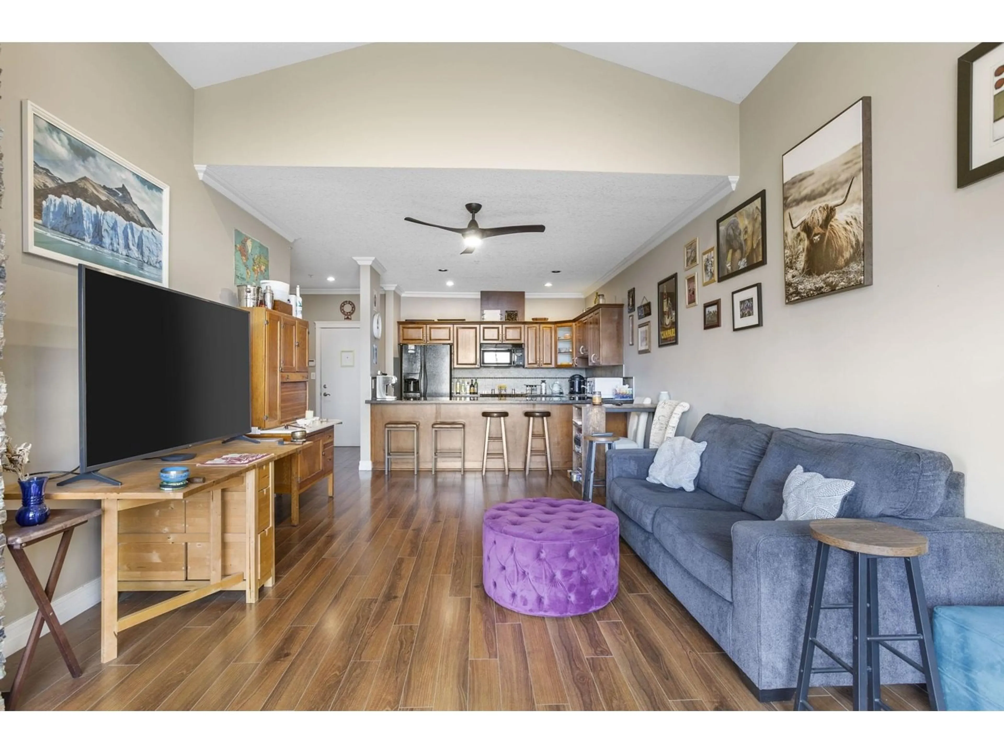 Living room with furniture, wood/laminate floor for B305 - 33755 7TH, Mission British Columbia V2V0A4