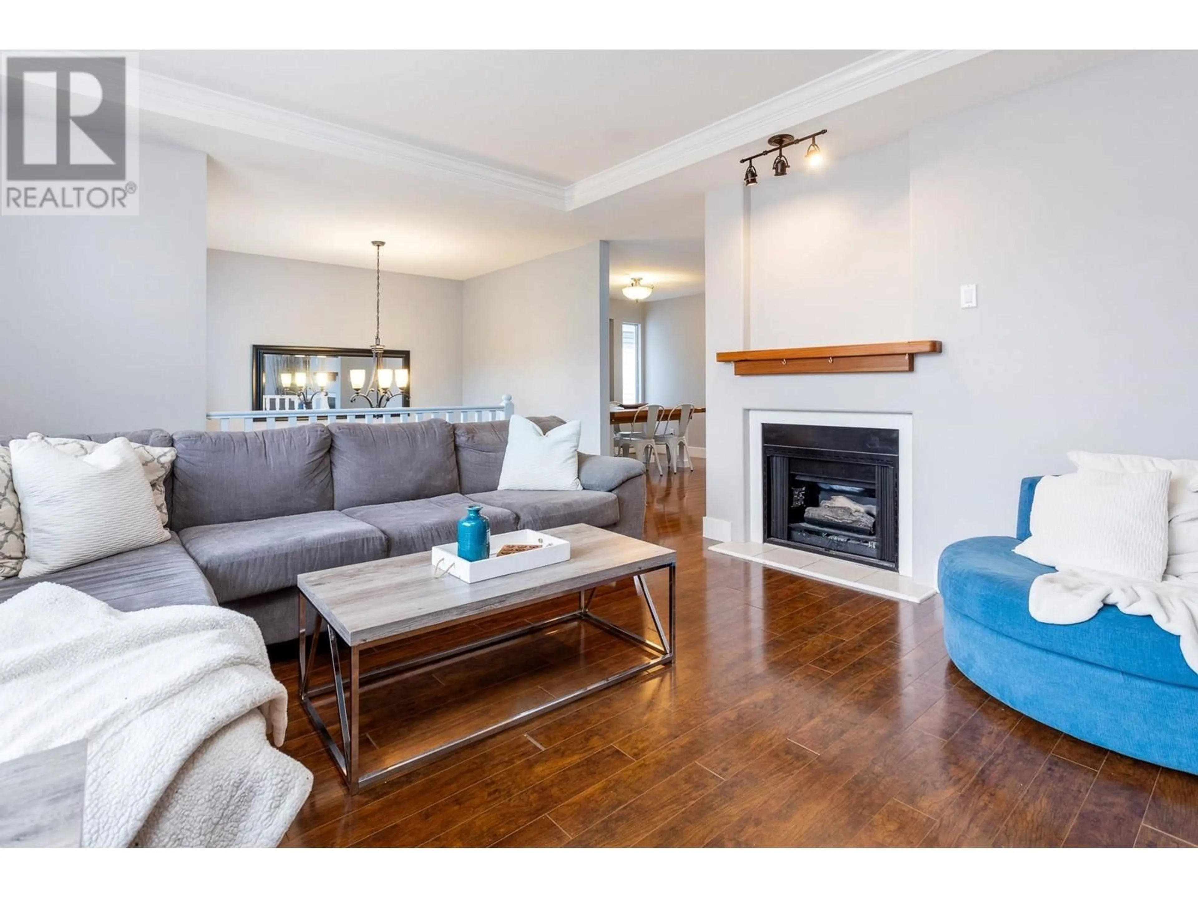 Living room with furniture, wood/laminate floor for 2230 HAWTHORNE AVENUE, Port Coquitlam British Columbia V3C1W6