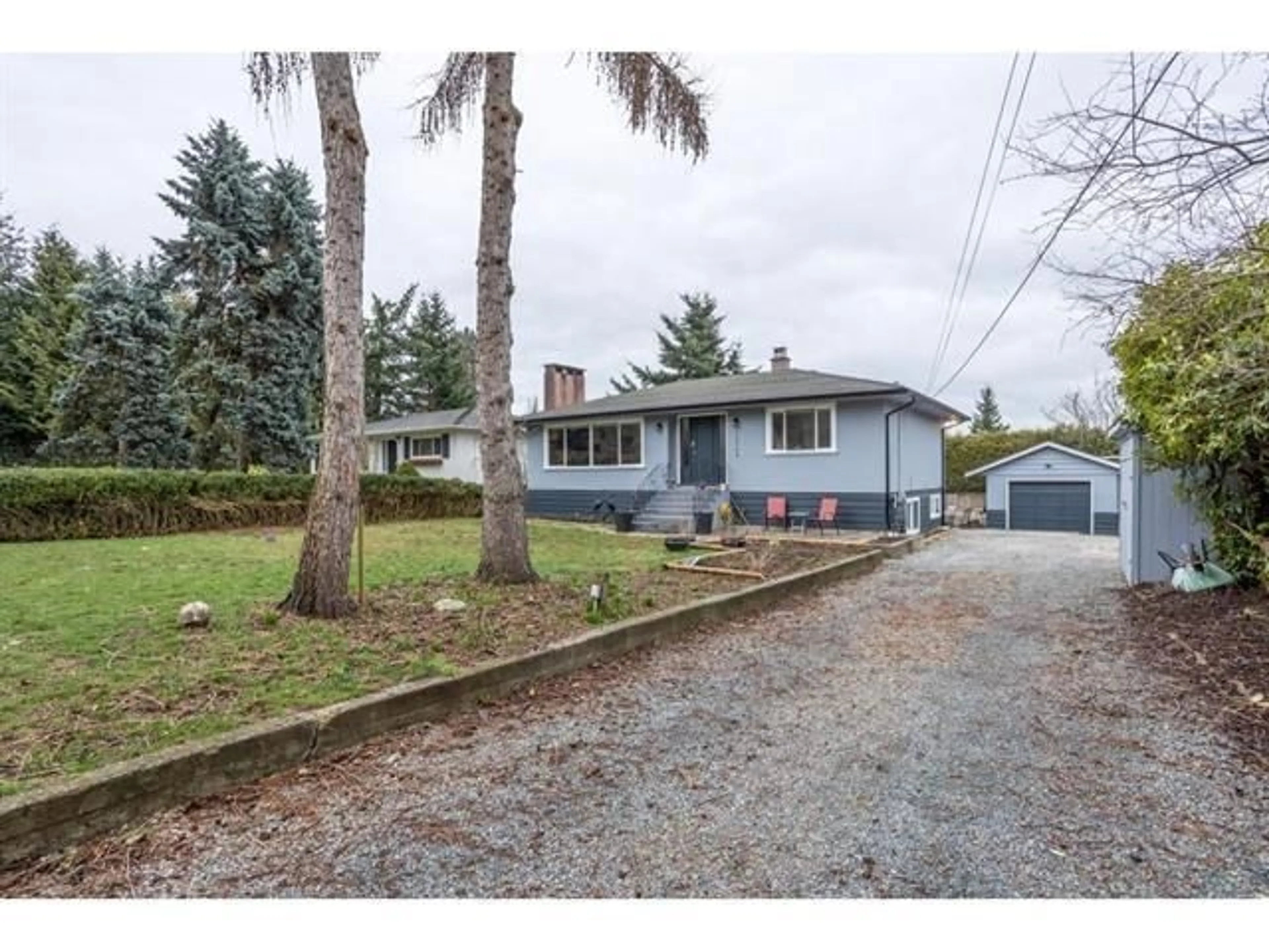 A pic from outside/outdoor area/front of a property/back of a property/a pic from drone, street for 13548 15, Surrey British Columbia V4A1L2