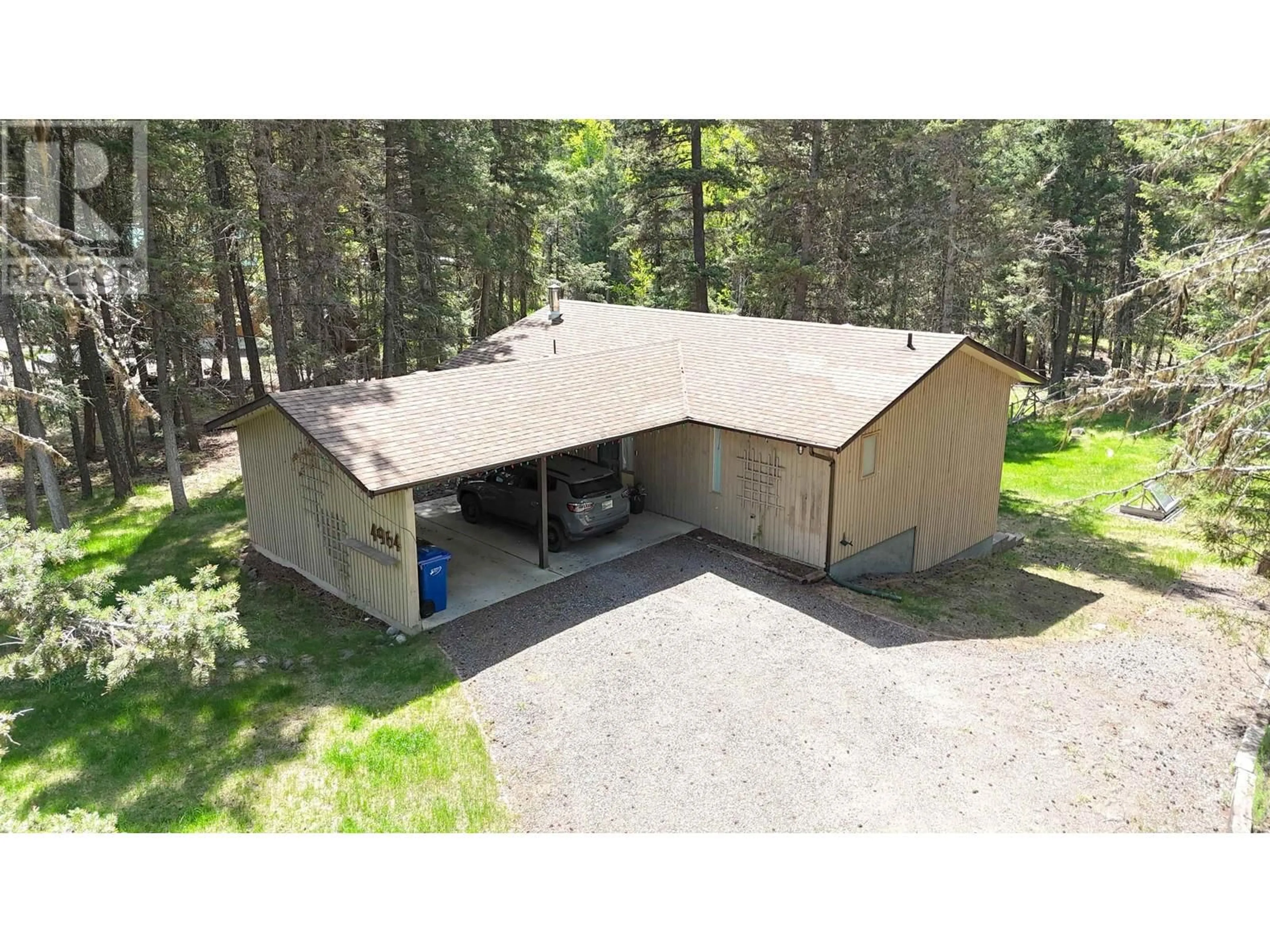 A pic from outside/outdoor area/front of a property/back of a property/a pic from drone, unknown for 4964 MONICAL ROAD, 108 Mile Ranch British Columbia V0K2Z0