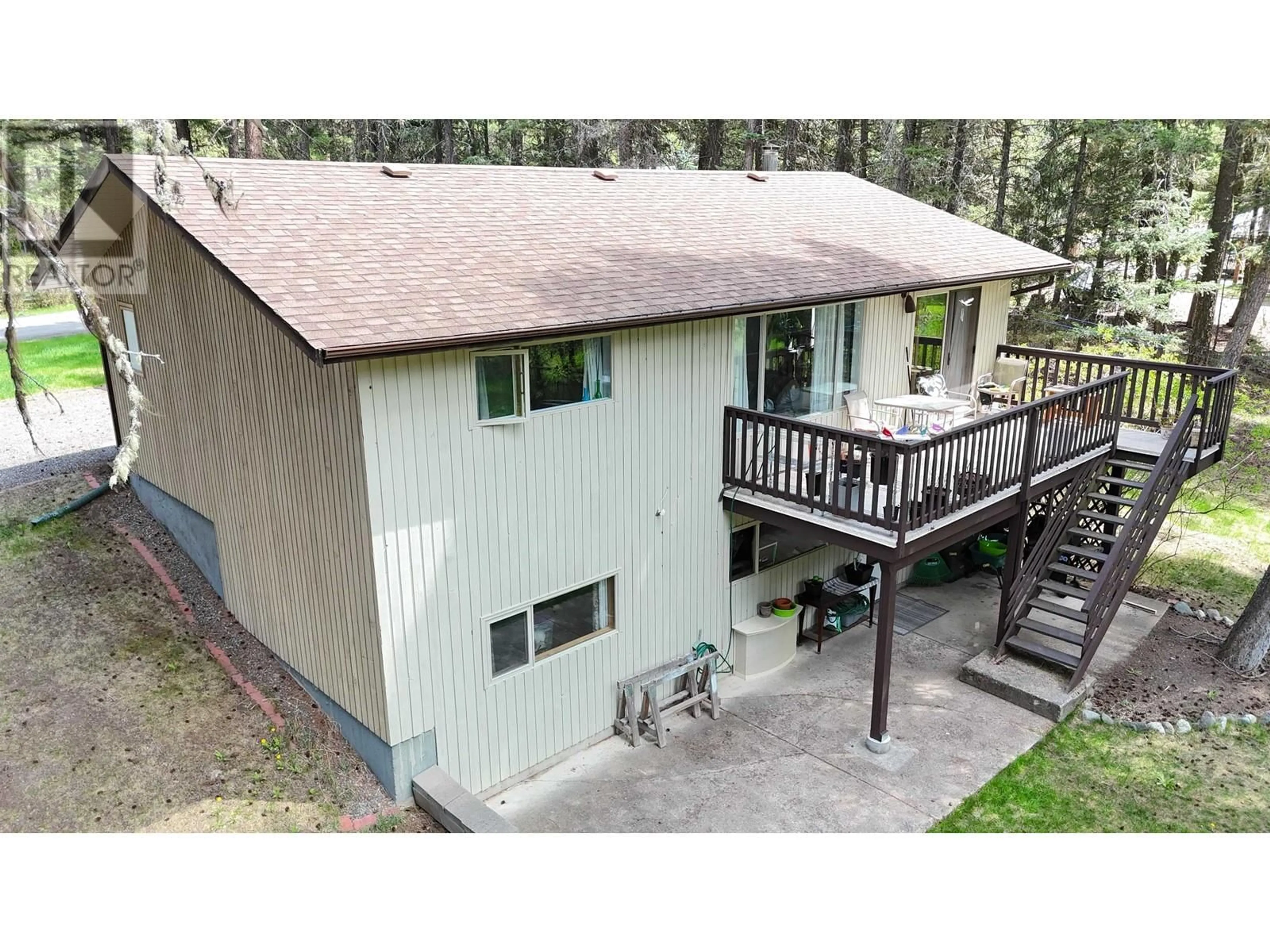 A pic from outside/outdoor area/front of a property/back of a property/a pic from drone, unknown for 4964 MONICAL ROAD, 108 Mile Ranch British Columbia V0K2Z0