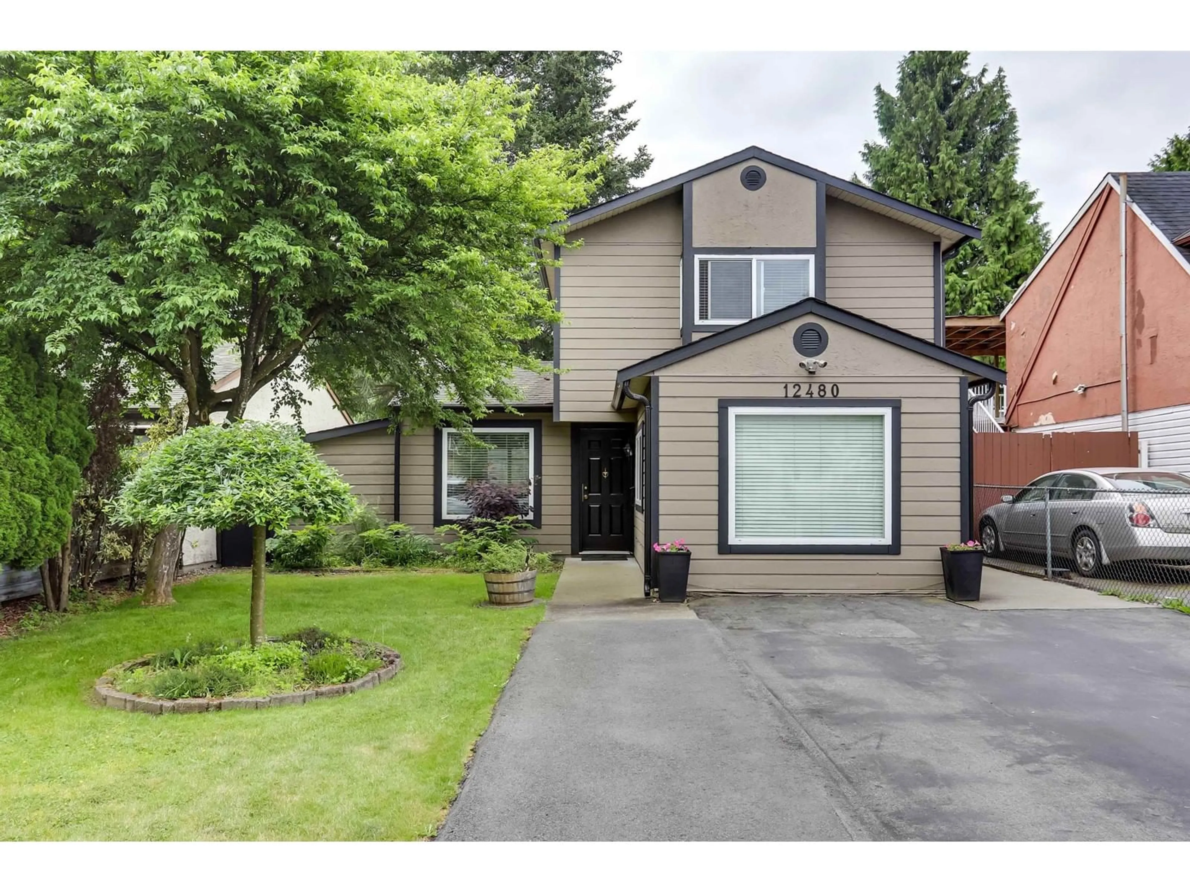 Home with vinyl exterior material, street for 12480 78, Surrey British Columbia V3W8K1