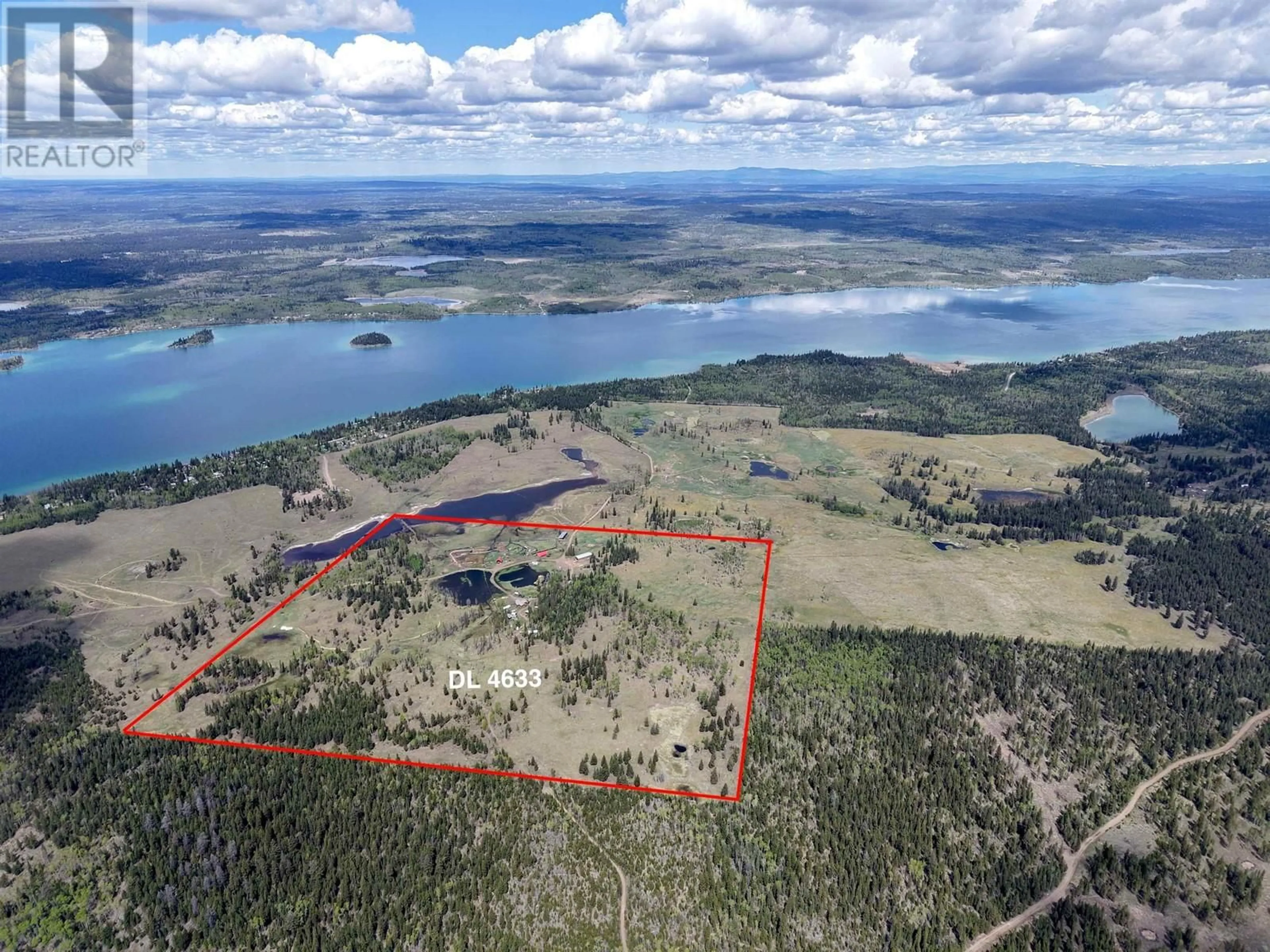 A pic from outside/outdoor area/front of a property/back of a property/a pic from drone, water/lake/river/ocean view for 938 GREEN LAKE ROAD, 70 Mile House British Columbia V0K2K2