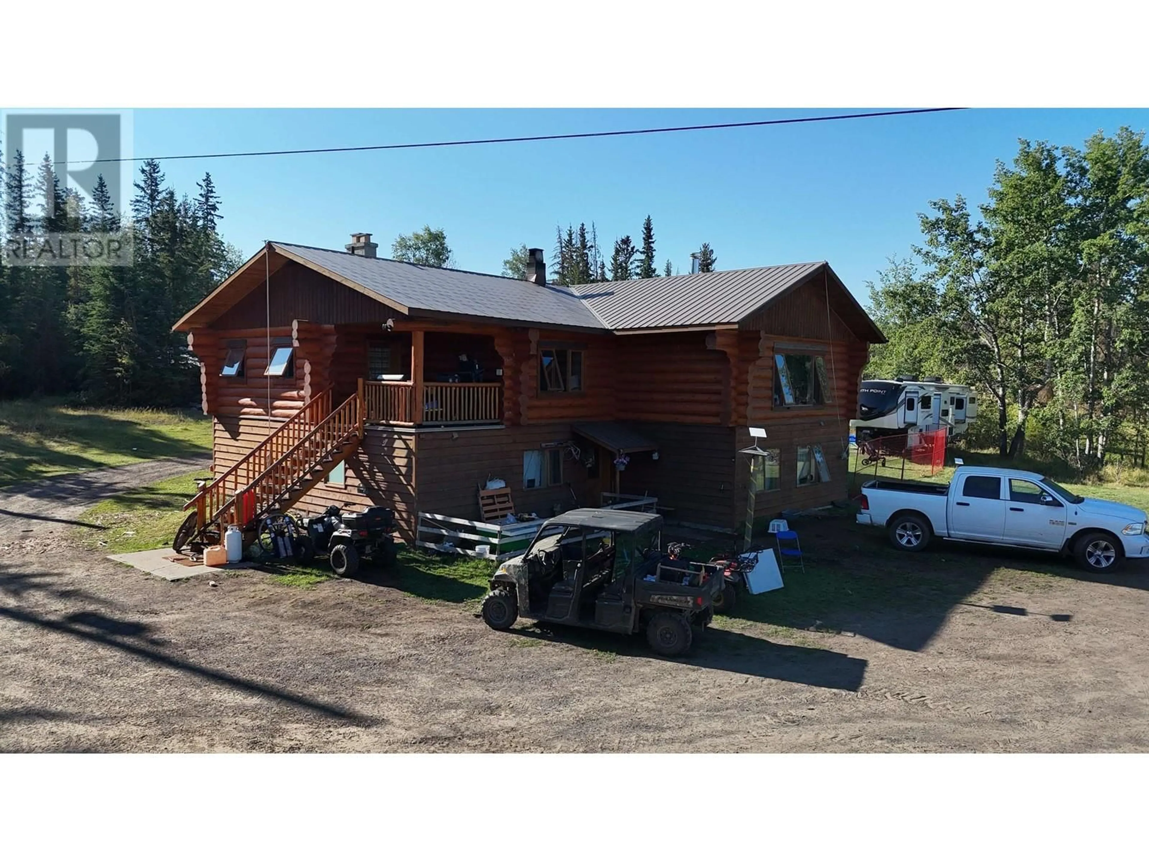 A pic from outside/outdoor area/front of a property/back of a property/a pic from drone, building for 938 GREEN LAKE ROAD, 70 Mile House British Columbia V0K2K2