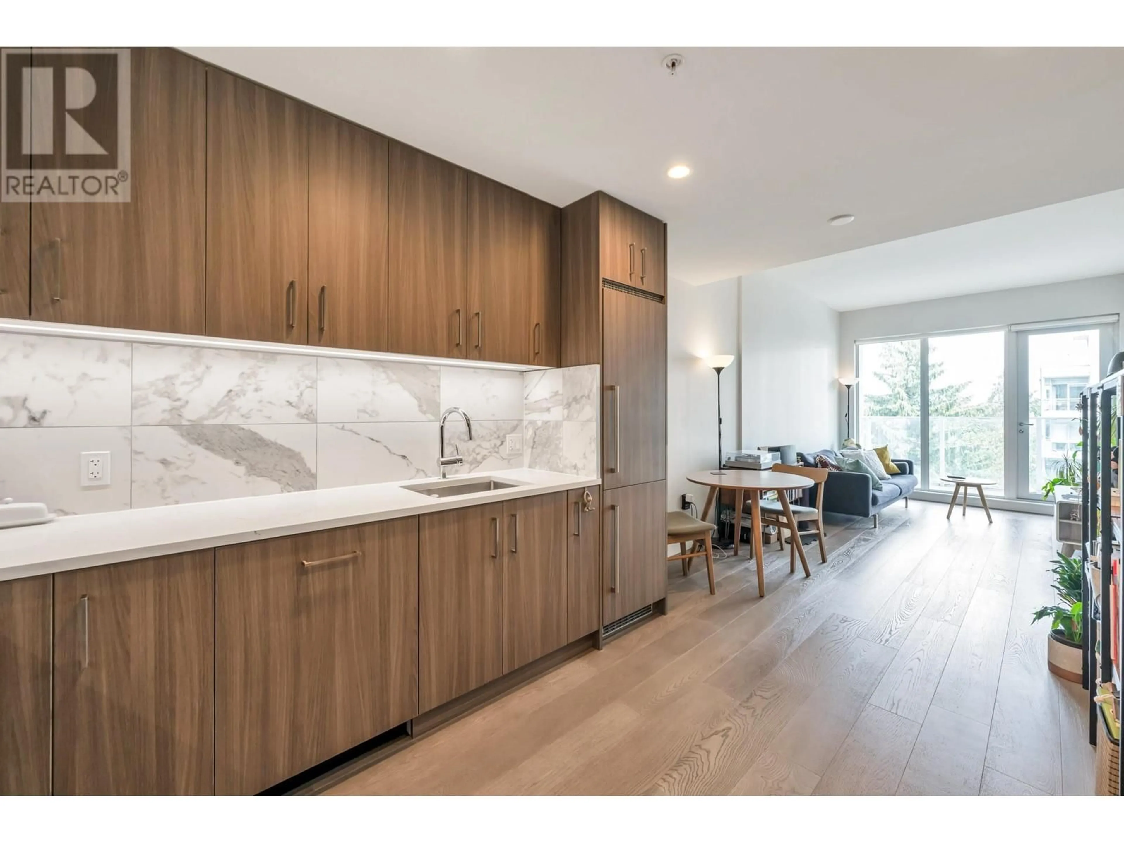Open concept kitchen, unknown for 209 - 528 KING EDWARD AVENUE, Vancouver British Columbia V5Z2C3