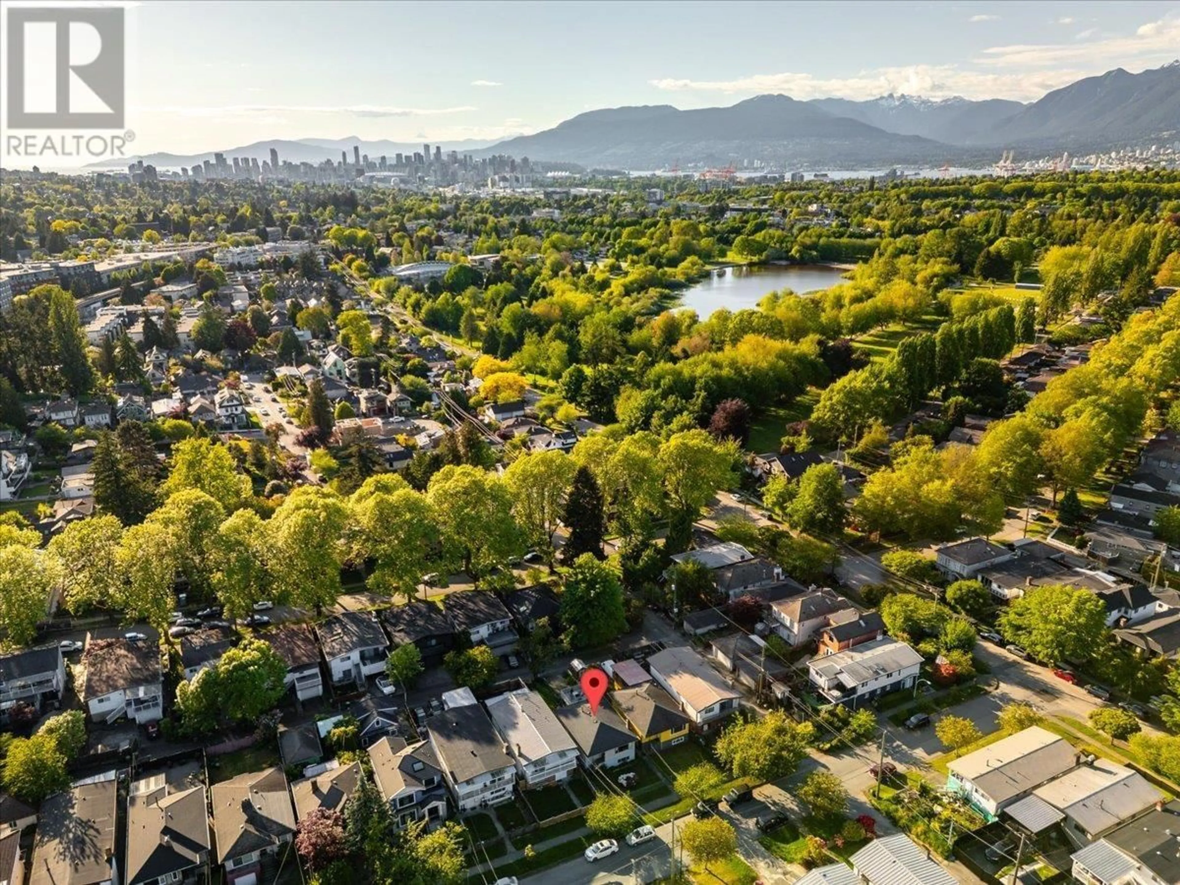 A pic from outside/outdoor area/front of a property/back of a property/a pic from drone, mountain view for 3531 WALKER STREET, Vancouver British Columbia V5N5A9
