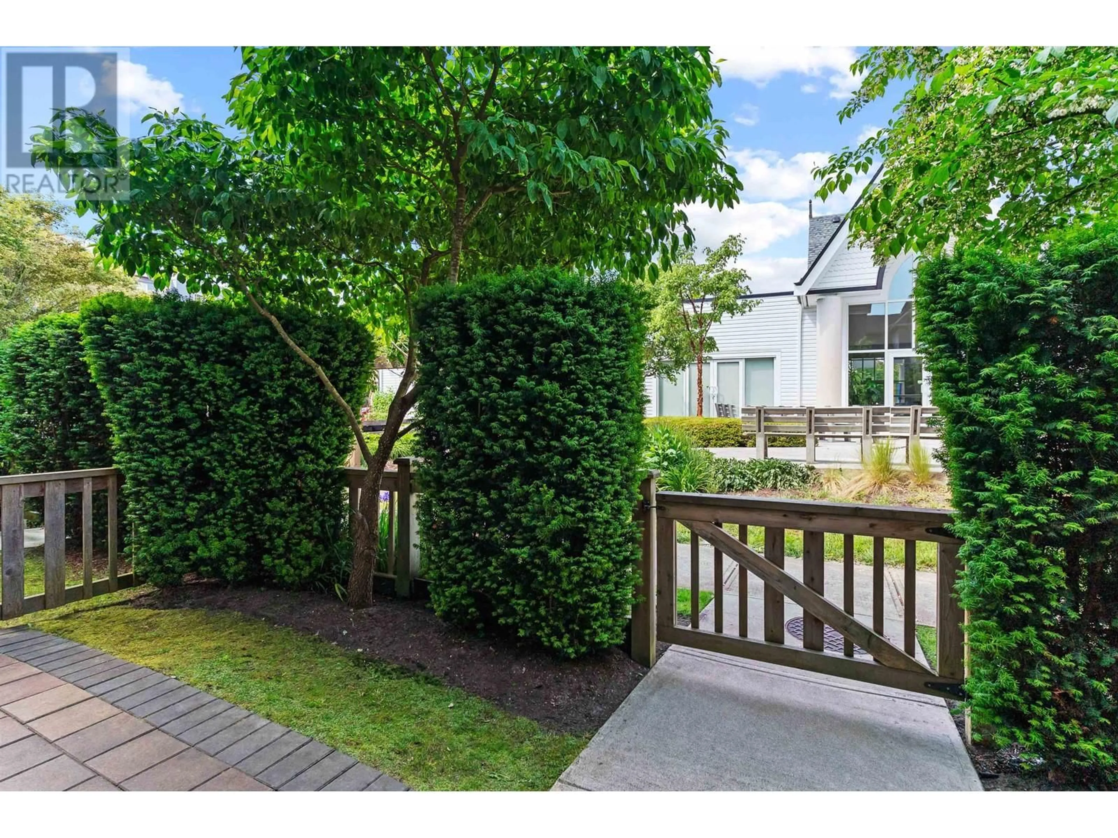 A pic from outside/outdoor area/front of a property/back of a property/a pic from drone, street for 4 - 4949 47A AVENUE, Delta British Columbia V4K1T6