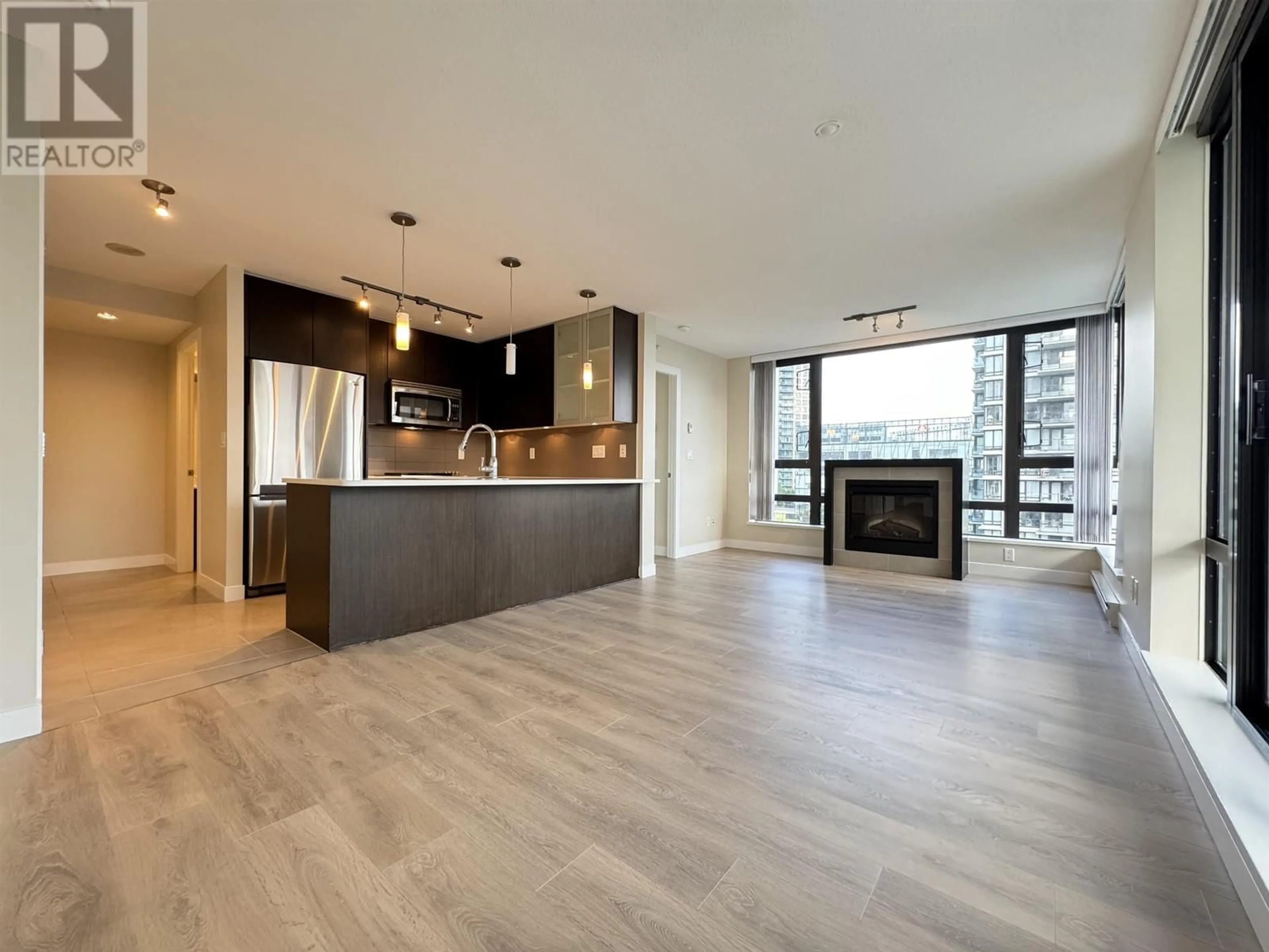 Open concept kitchen, wood/laminate floor for 906 - 7325 ARCOLA STREET, Burnaby British Columbia V5E0A8