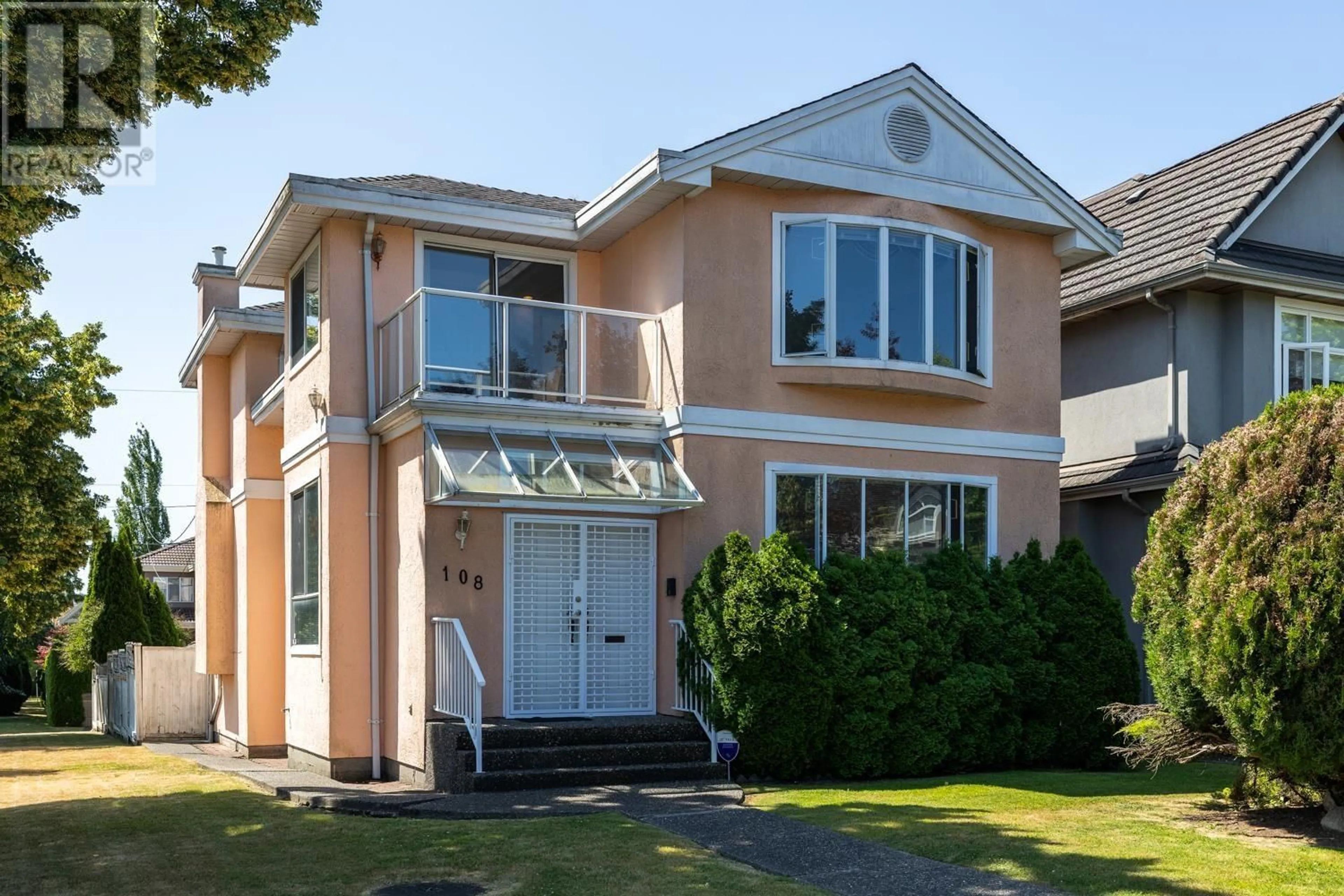 Home with vinyl exterior material, street for 108 46 AVENUE, Vancouver British Columbia V5Y2W9