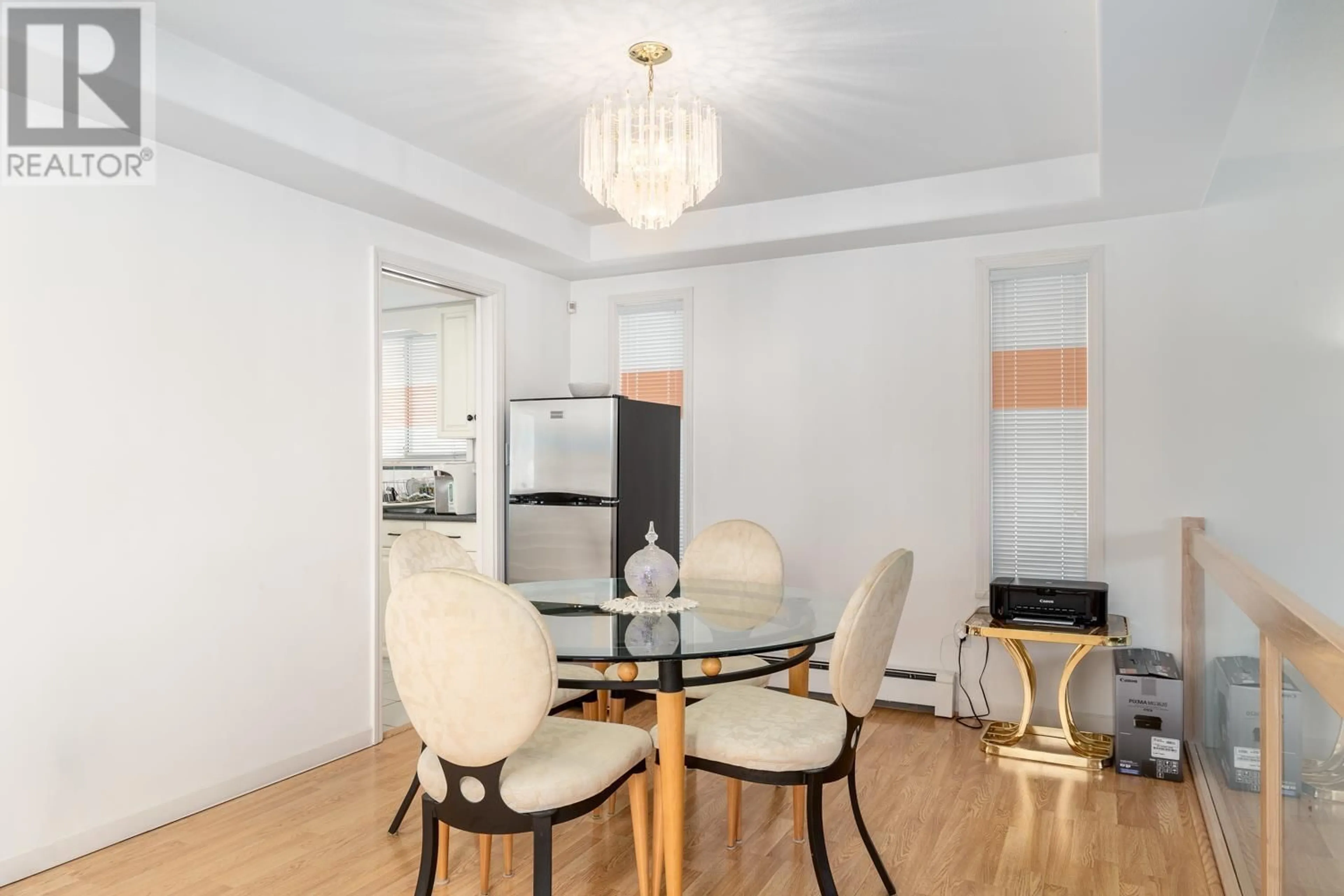 Dining room, wood/laminate floor for 108 46 AVENUE, Vancouver British Columbia V5Y2W9