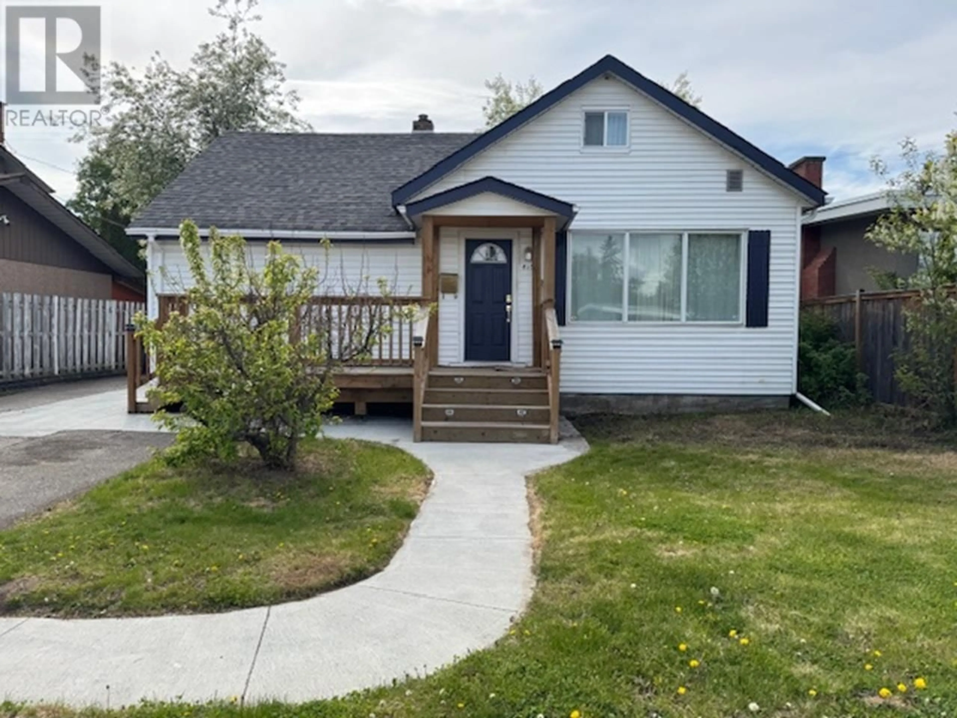 Home with vinyl exterior material, street for 413 FREEMAN STREET, Prince George British Columbia V2M2P9
