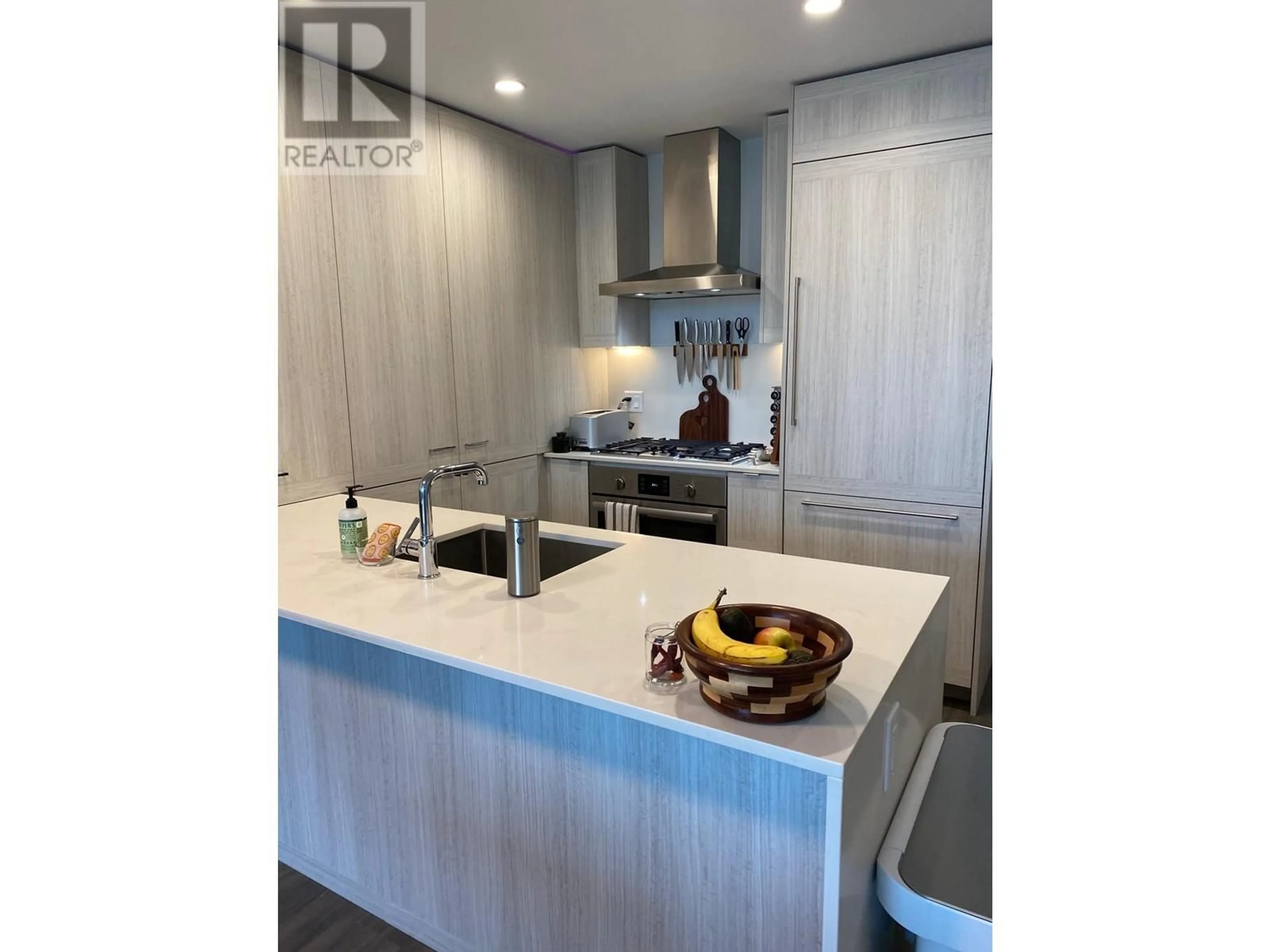 Open concept kitchen, wood/laminate floor for TH307 - 2351 BETA AVENUE, Burnaby British Columbia V5C0M2
