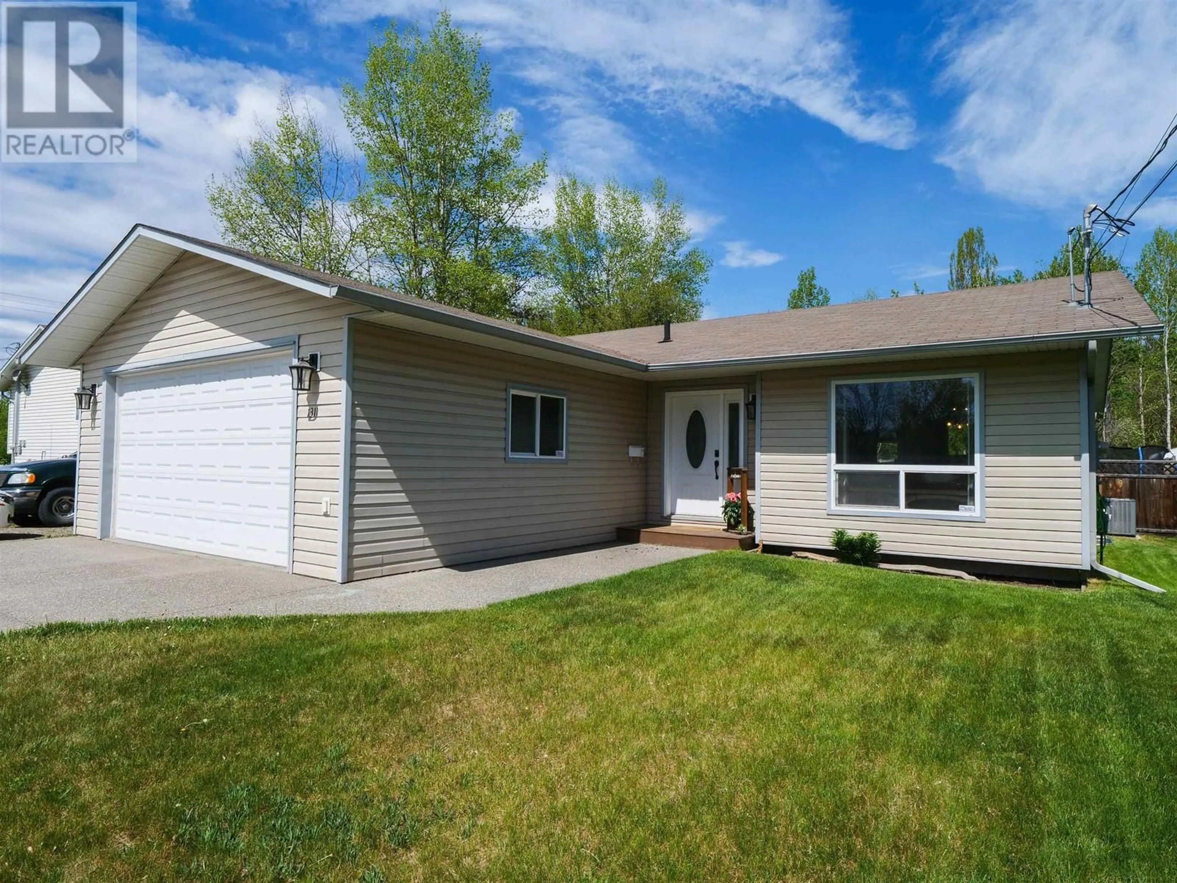 Home with vinyl exterior material, street for 1311 NASON STREET, Quesnel British Columbia V2J6B4