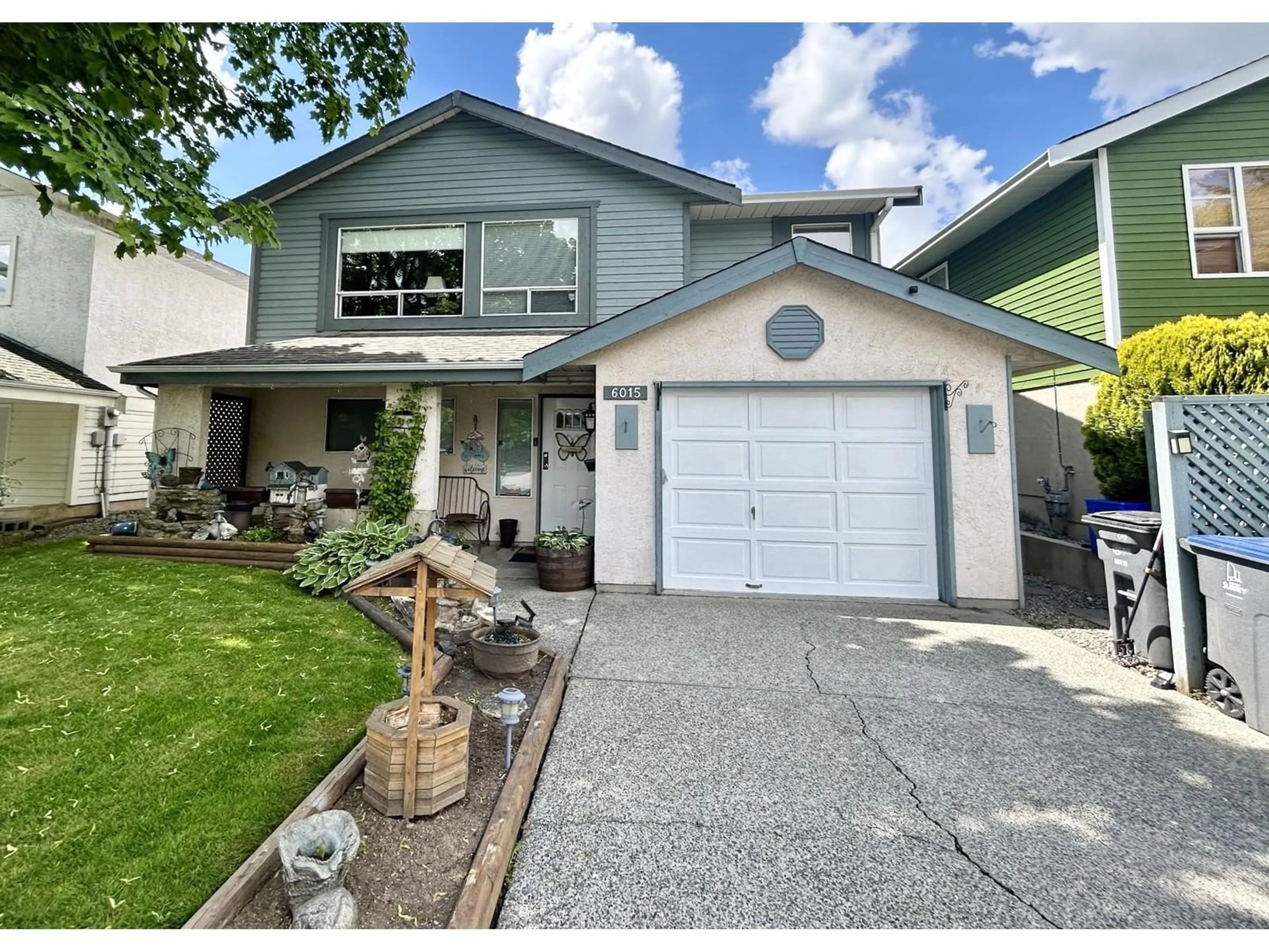 Home with vinyl exterior material, street for 6015 195A, Surrey British Columbia V3S7K9